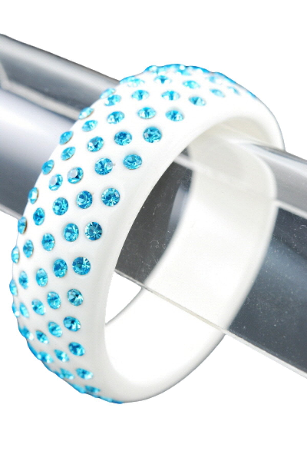 A stylish plastic stone bangle with a 3-inch diameter and 1-inch width, showcasing its elegant design.