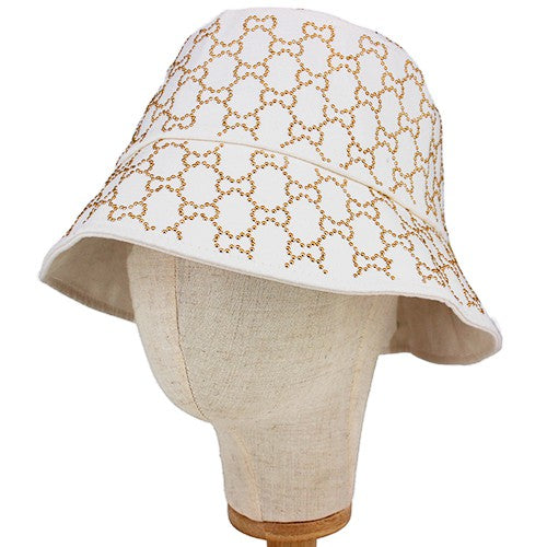 A stylish polyester bucket hat featuring hot fix embellishments, perfect for sunny days and outdoor activities.