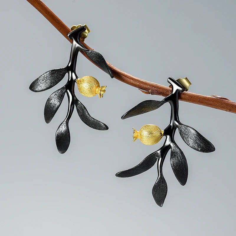 Elegant Pomegranate Branch Earrings featuring a silver leaf design with 18K gold plating and a natural pearl accent.