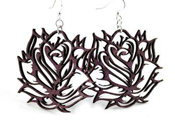 A pair of purple Prickly Rose Earrings made from sustainably sourced wood, featuring intricate laser-cut designs and hypoallergenic silver-finished ear wires.