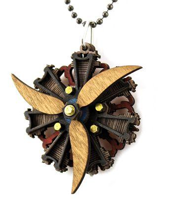 Radial Three Propeller Engine Necklace 7002A featuring a spinning propeller design made from sustainably sourced wood in vibrant colors.