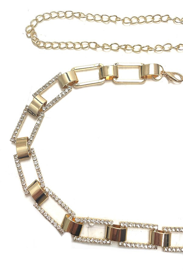 A stylish rectangular shape link chain belt adorned with rhinestones, featuring a lobster claw clasp and an extender for adjustable length.