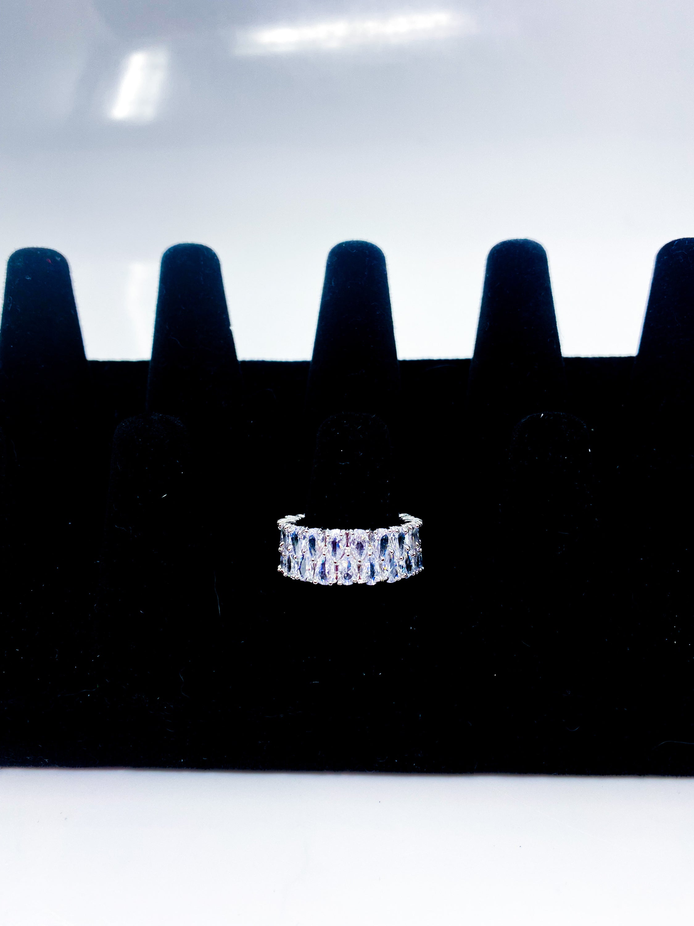 So Icy Diamond Double Layer Ring in high polished white gold with flawless VVS simulants, showcasing a stackable design and elegant baguette eternity style.