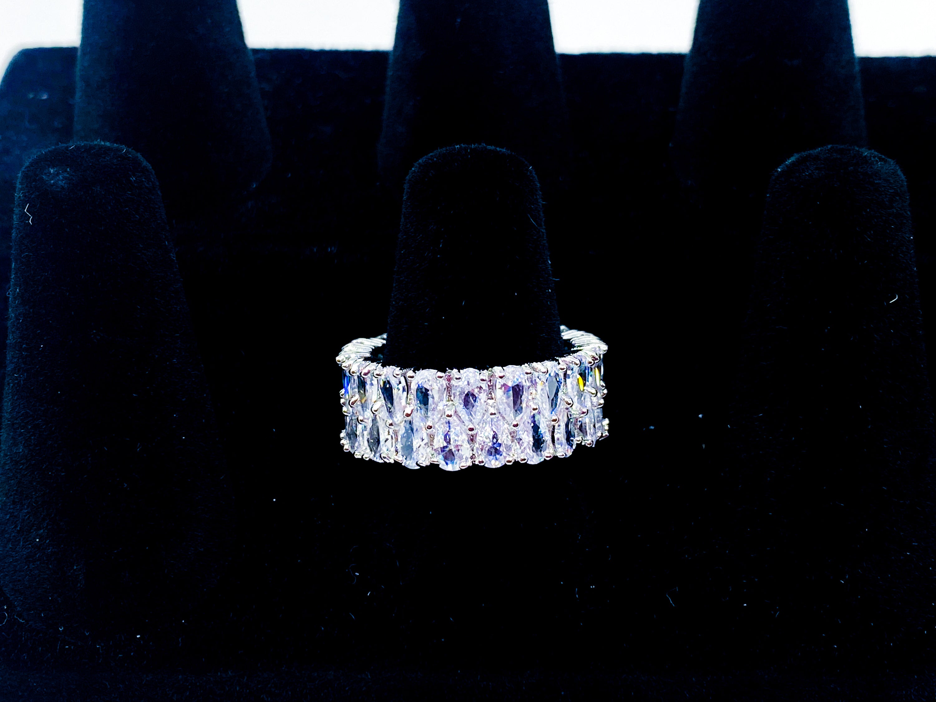 So Icy Diamond Double Layer Ring in high polished white gold with flawless VVS simulants, showcasing a stackable design and elegant baguette eternity style.