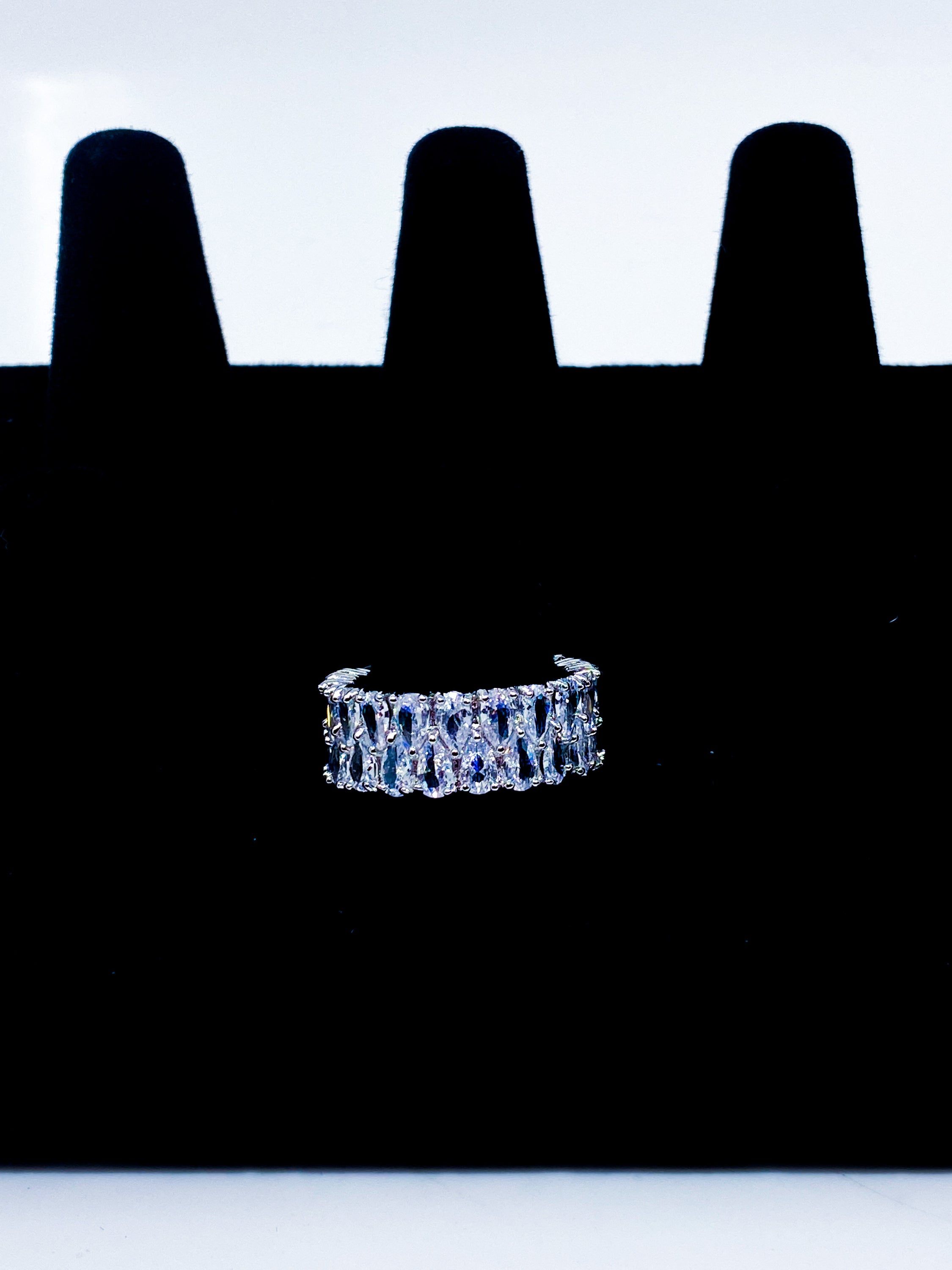 So Icy Diamond Double Layer Ring in high polished white gold with flawless VVS simulants, showcasing a stackable design and elegant baguette eternity style.