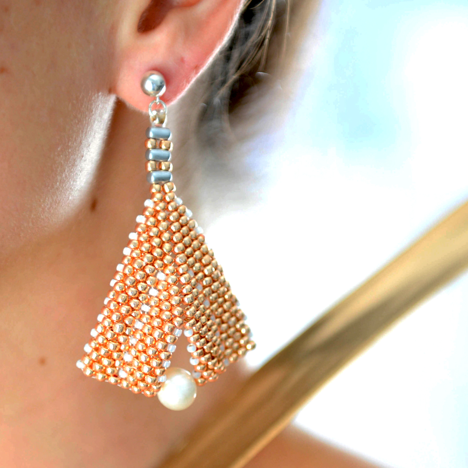 A pair of elegant Rose Gold & Freshwater Pearl Statement Earrings featuring Toho seed beads and sterling silver studs, showcasing a luxurious design.