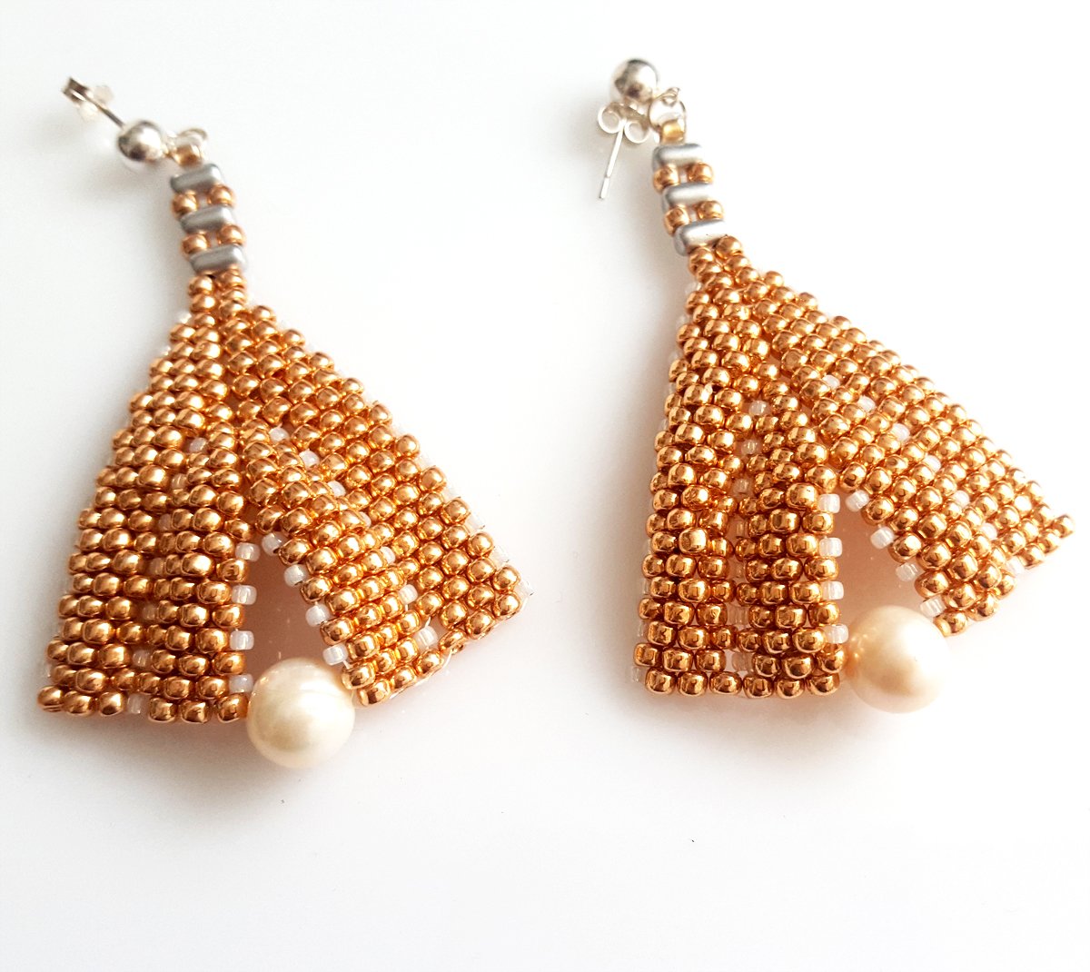 A pair of elegant Rose Gold & Freshwater Pearl Statement Earrings featuring Toho seed beads and sterling silver studs, showcasing a luxurious design.