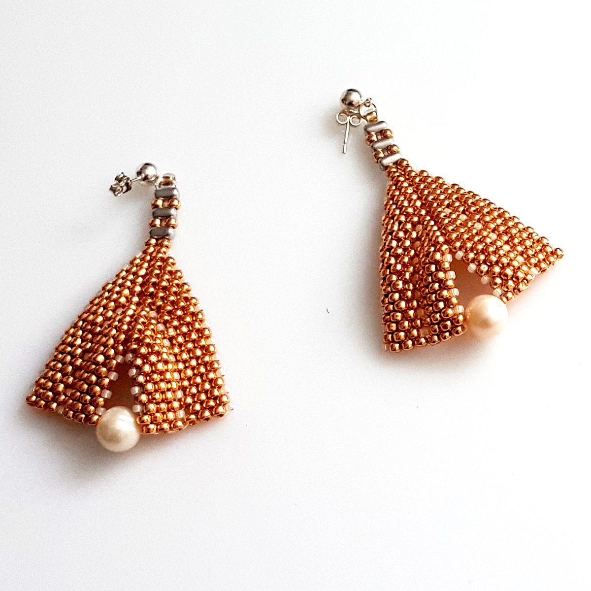 A pair of elegant Rose Gold & Freshwater Pearl Statement Earrings featuring Toho seed beads and sterling silver studs, showcasing a luxurious design.