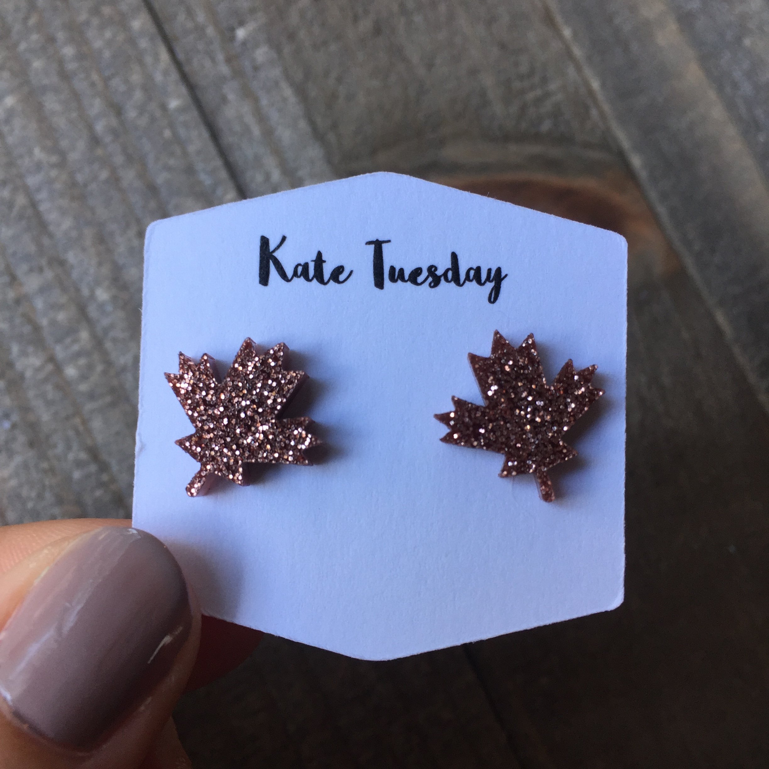 Rose Gold Sparkly Maple Leaf Stud Acrylic Earrings with a shimmering finish, showcasing their elegant design and lightweight material.