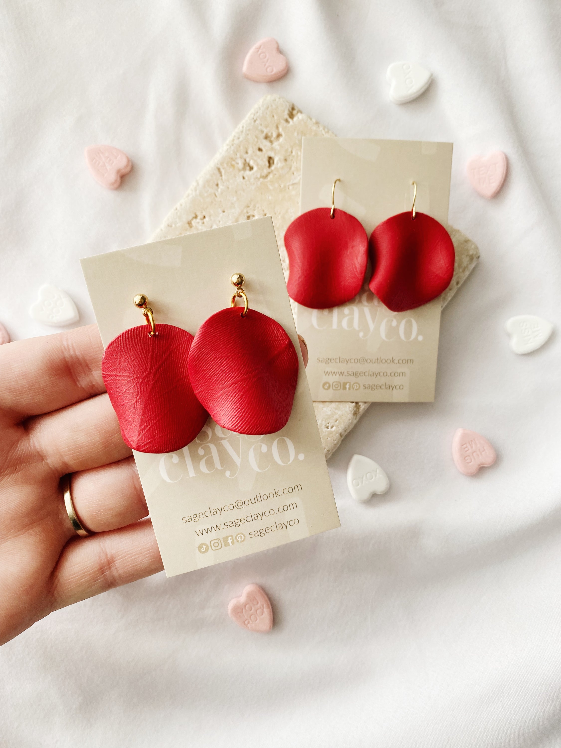 Handmade Rose Petal Drop Earrings made from polymer clay, featuring a unique design and hypoallergenic posts.