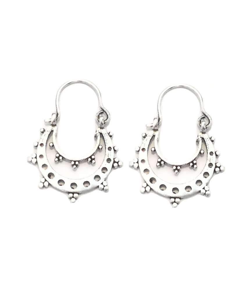 A pair of handcrafted Round Boho Earrings featuring intricate etching and U-shaped drops, made from brass and silver.