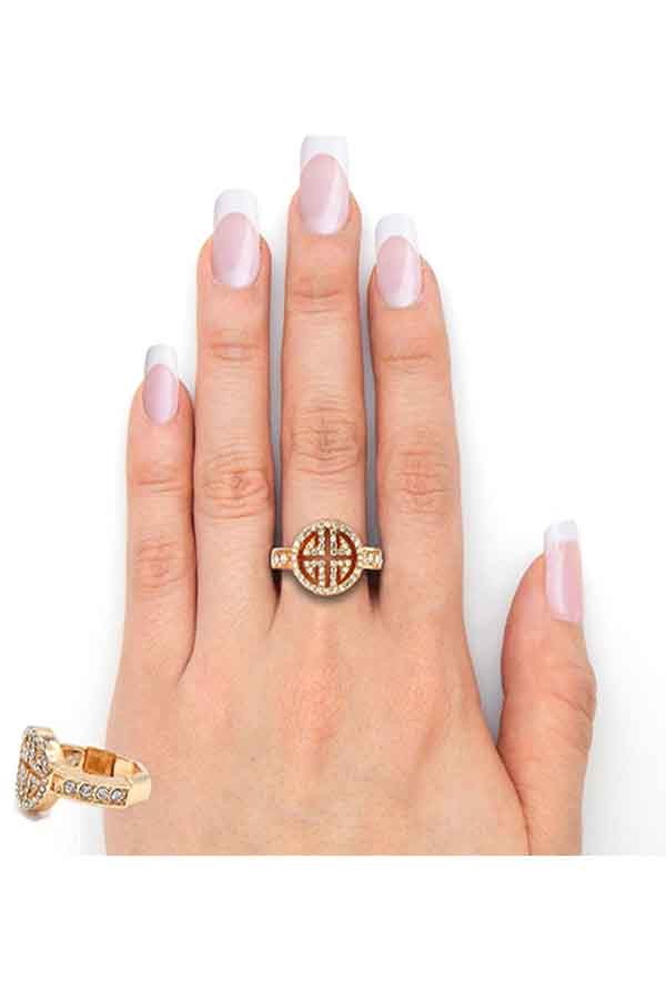 A stylish round stretch ring featuring a Greek key design embellished with sparkling rhinestones, showcasing elegance and versatility.