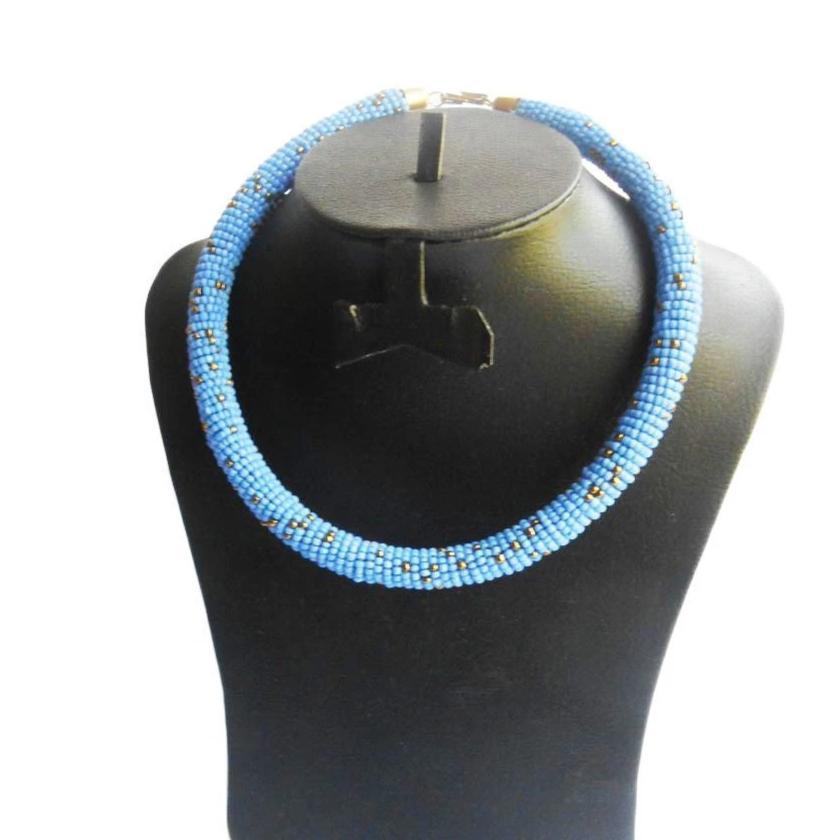 Round Maasai Beaded Choker in vibrant blue color, handcrafted with plastic beads, showcasing unique tribal design.