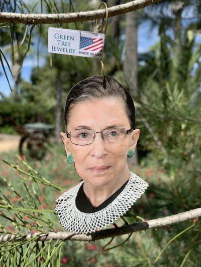 Ruth Bader Ginsburg Ornament made from sustainably sourced wood, featuring a laser-cut design with RBG's image on the front and a natural wood back.