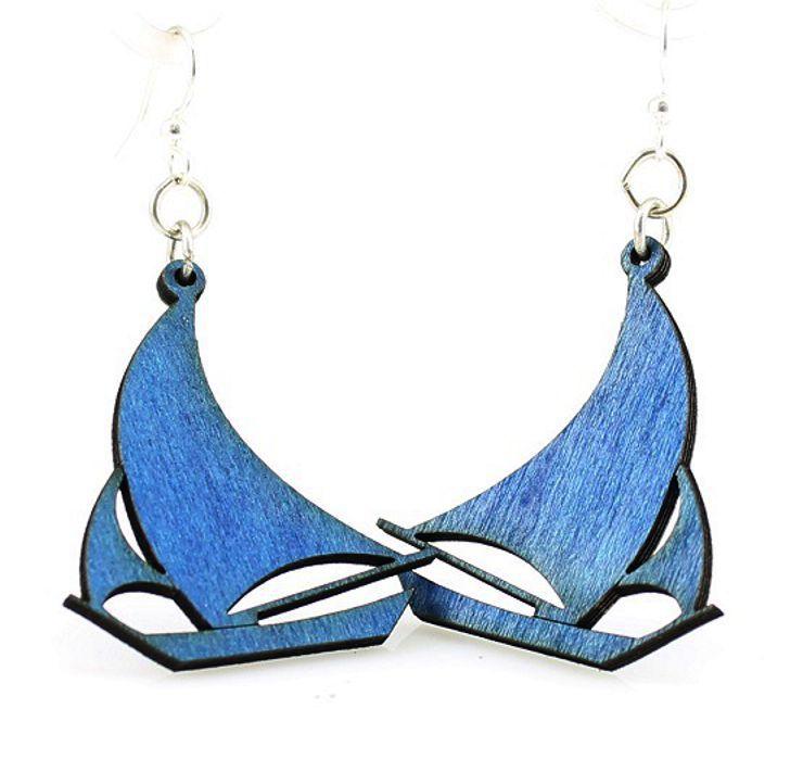 A pair of royal blue sail boat earrings made from sustainably sourced wood, featuring silver-finished stainless steel ear wires.