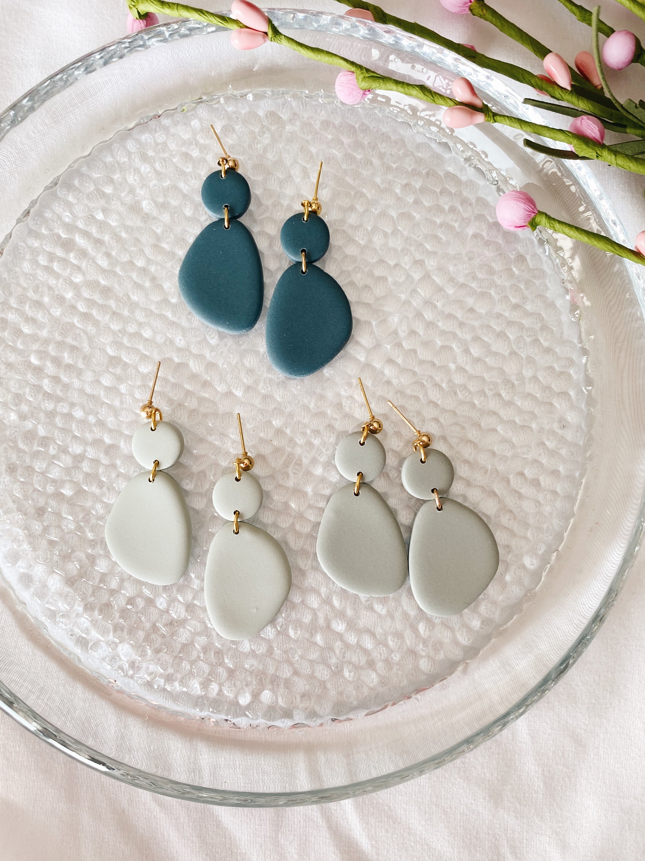 A pair of handcrafted minimalist statement earrings from the Selma Spring Fling Palette, showcasing unique designs and vibrant colors.