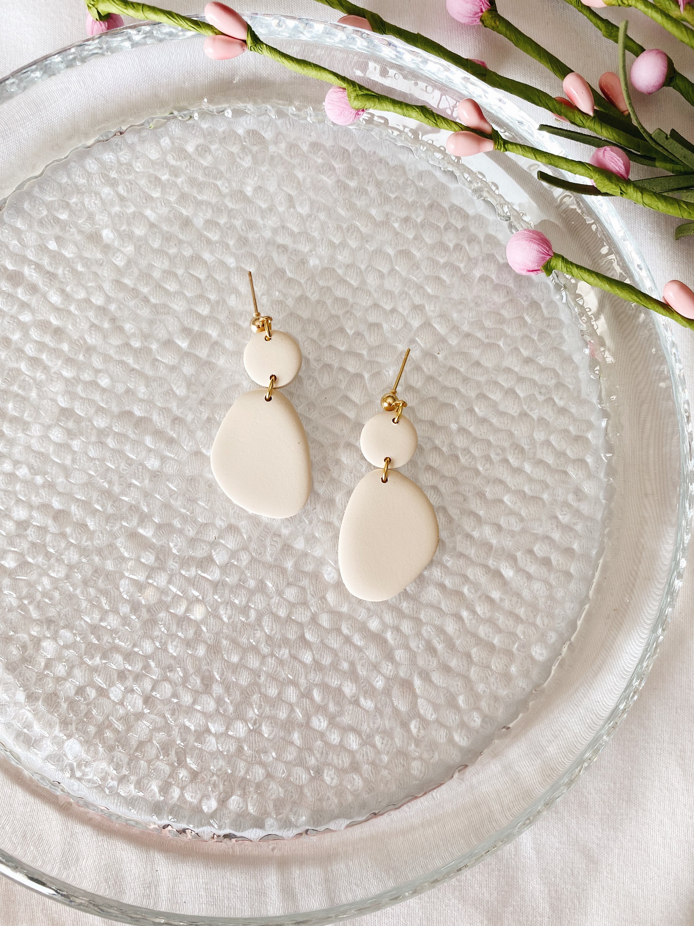 A pair of handcrafted minimalist statement earrings from the Selma Spring Fling Palette, showcasing unique designs and vibrant colors.