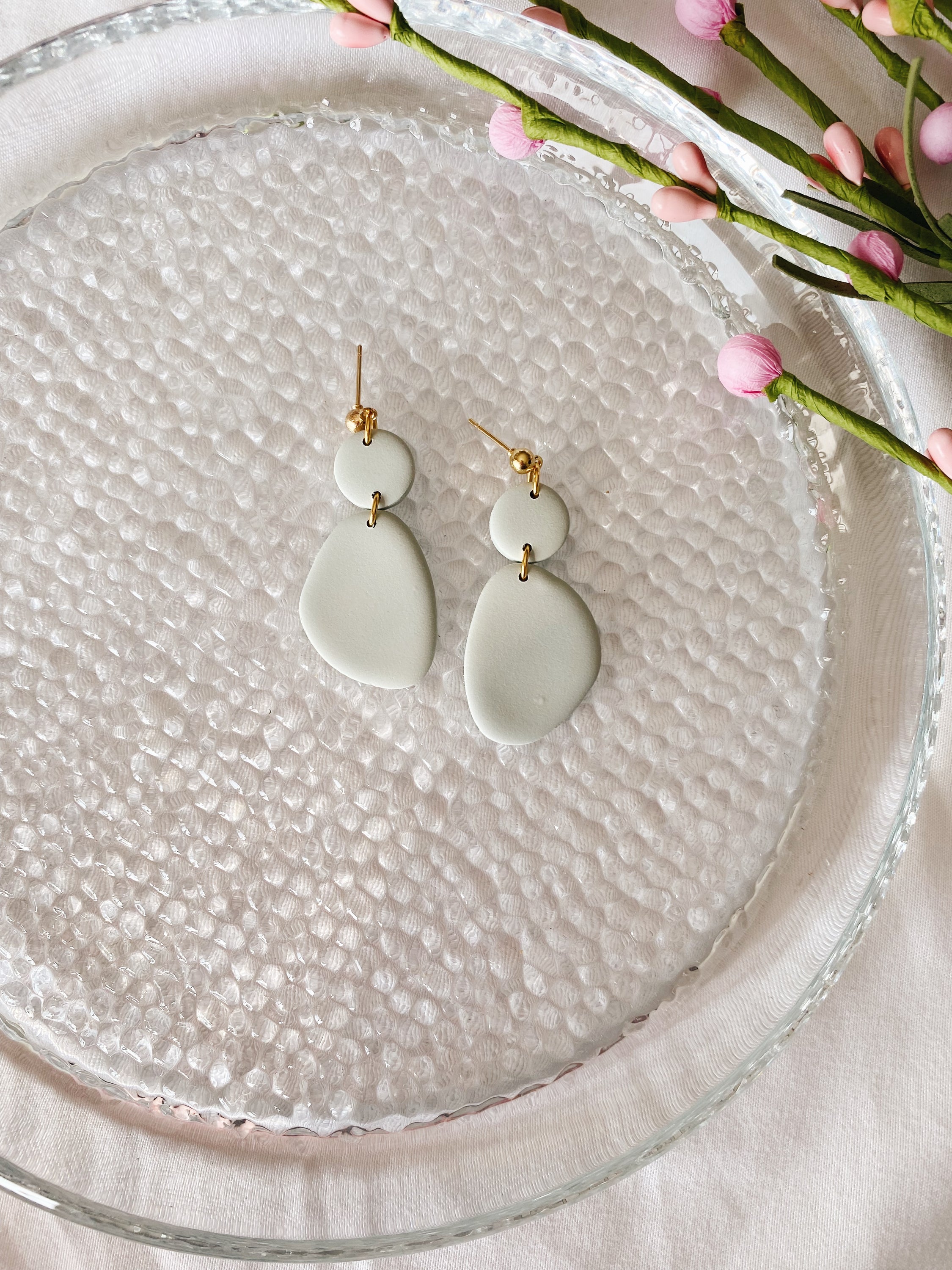 A pair of handcrafted minimalist statement earrings from the Selma Spring Fling Palette, showcasing unique designs and vibrant colors.