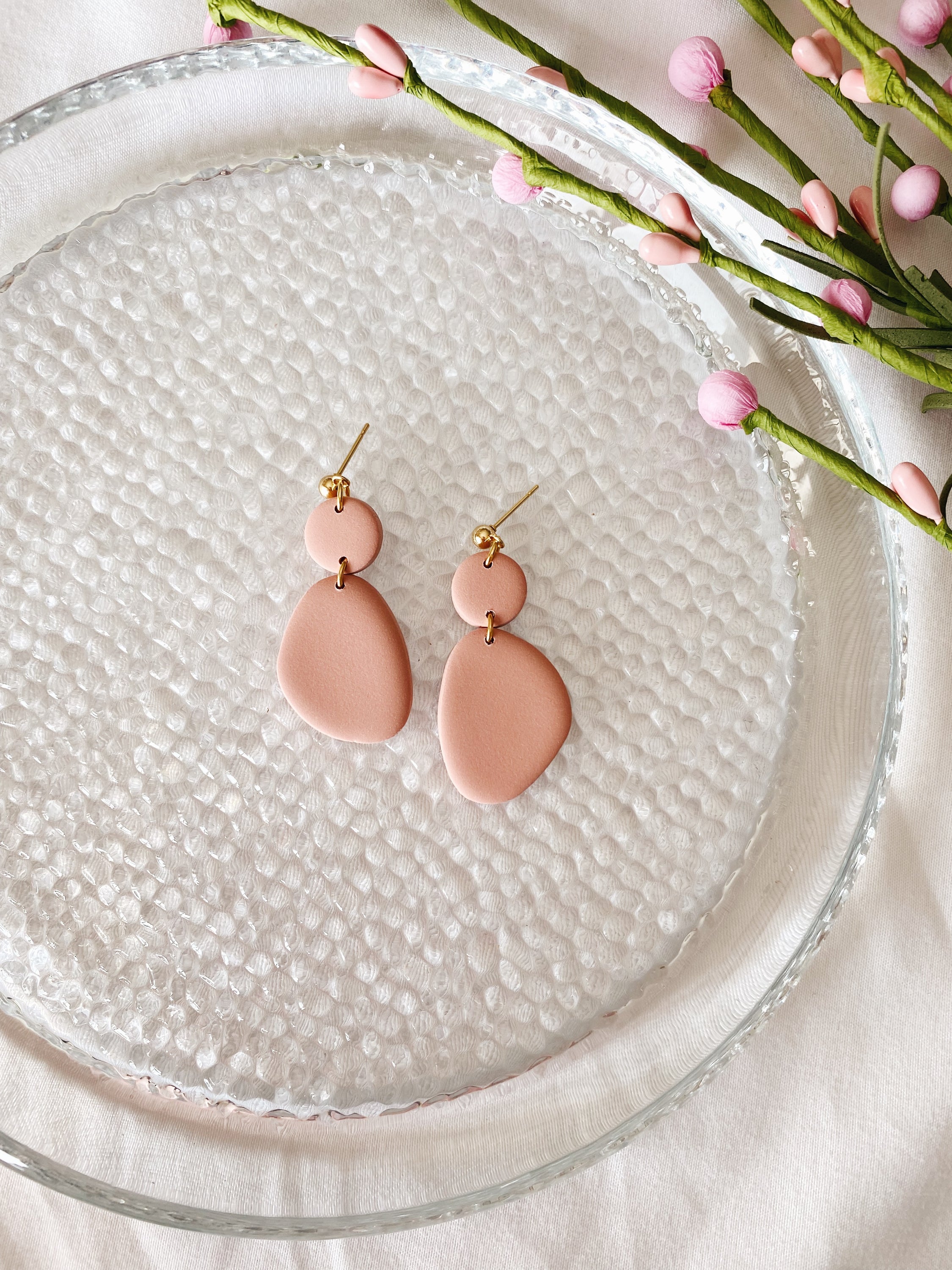 A pair of handcrafted minimalist statement earrings from the Selma Spring Fling Palette, showcasing unique designs and vibrant colors.