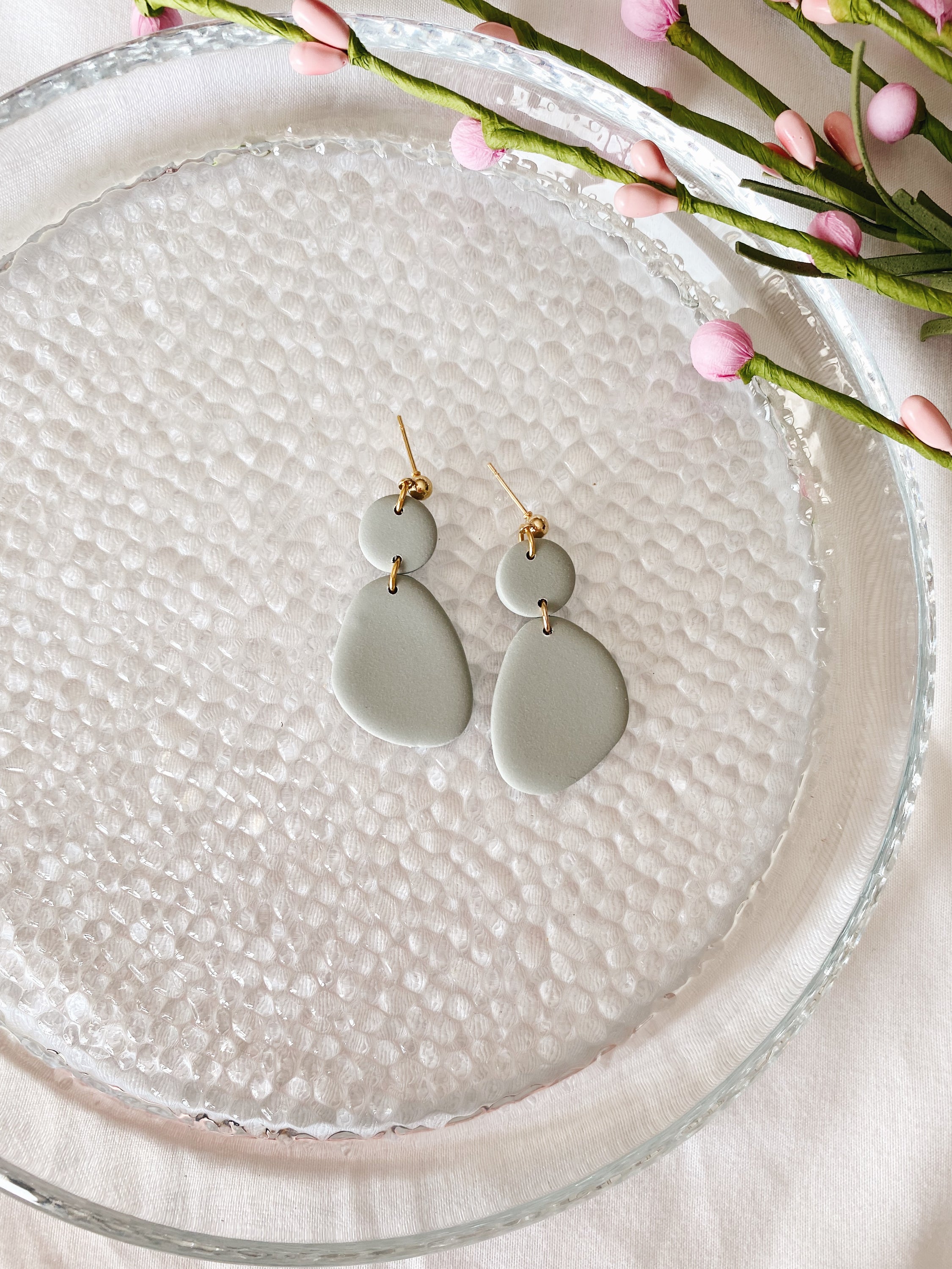 A pair of handcrafted minimalist statement earrings from the Selma Spring Fling Palette, showcasing unique designs and vibrant colors.