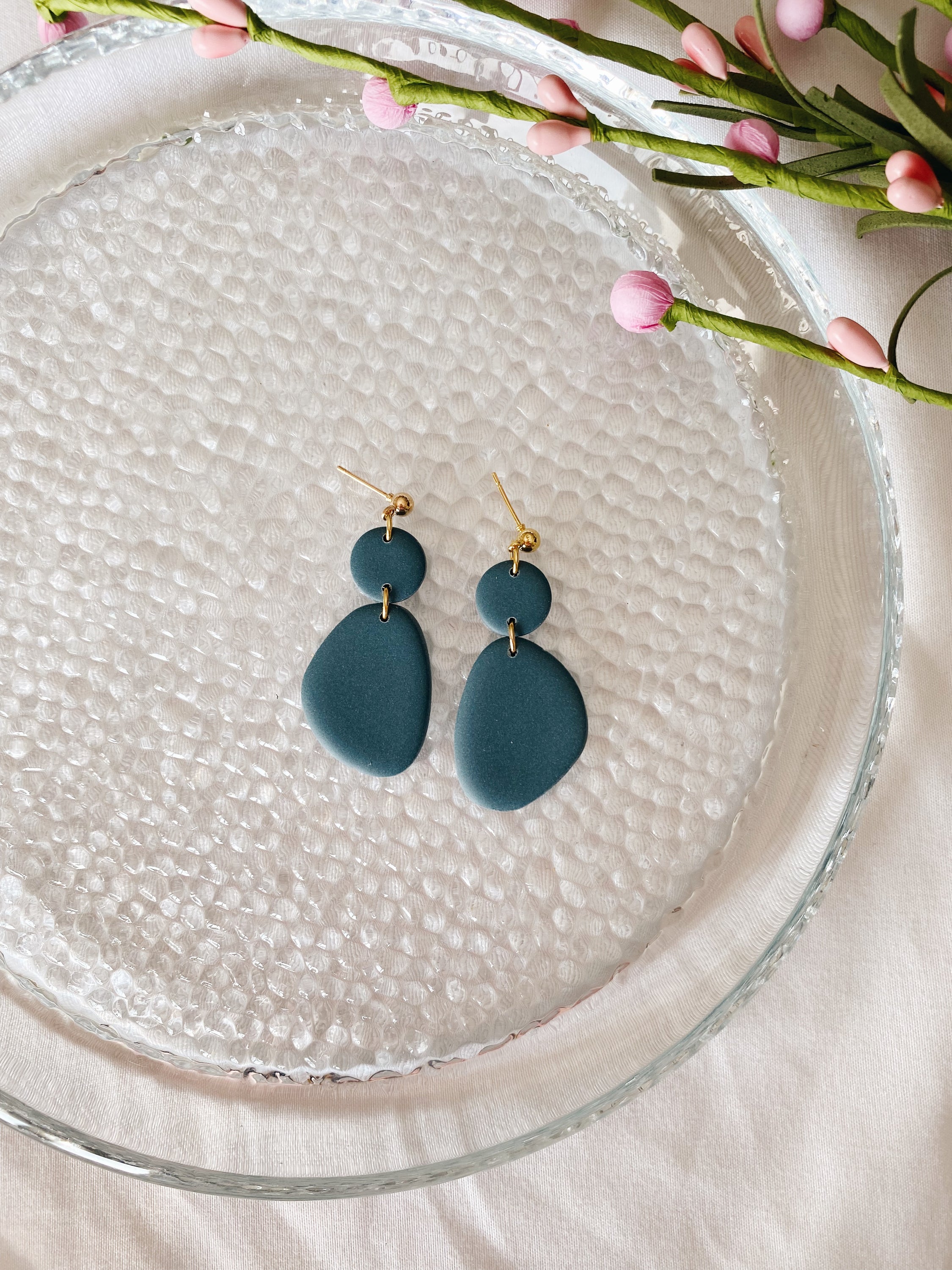 A pair of handcrafted minimalist statement earrings from the Selma Spring Fling Palette, showcasing unique designs and vibrant colors.