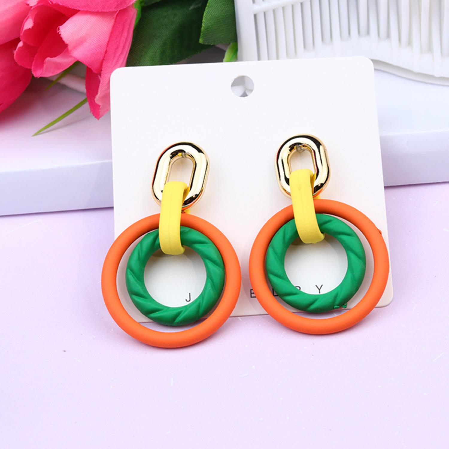 Smooth Texture Round Dangle Earring in vibrant colors, showcasing a stylish round design with a smooth finish.