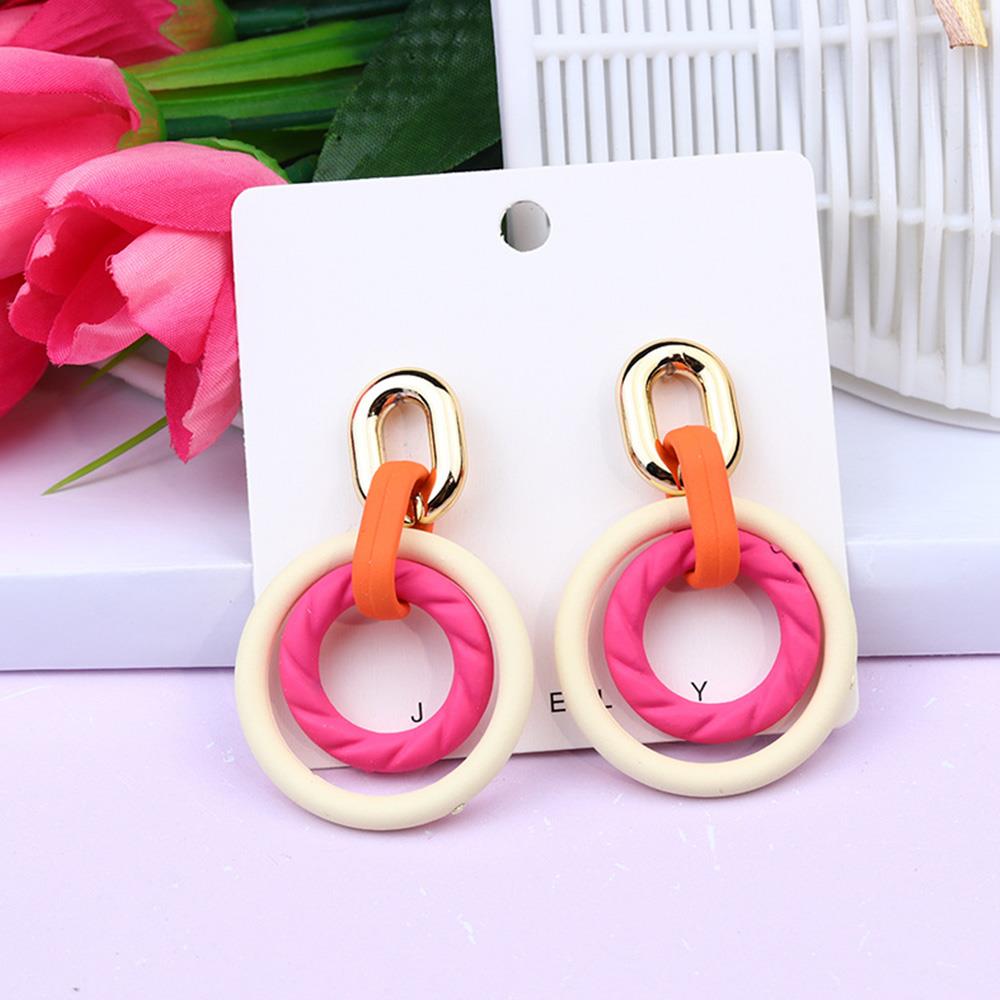 Smooth Texture Round Dangle Earring in vibrant colors, showcasing a stylish round design with a smooth finish.