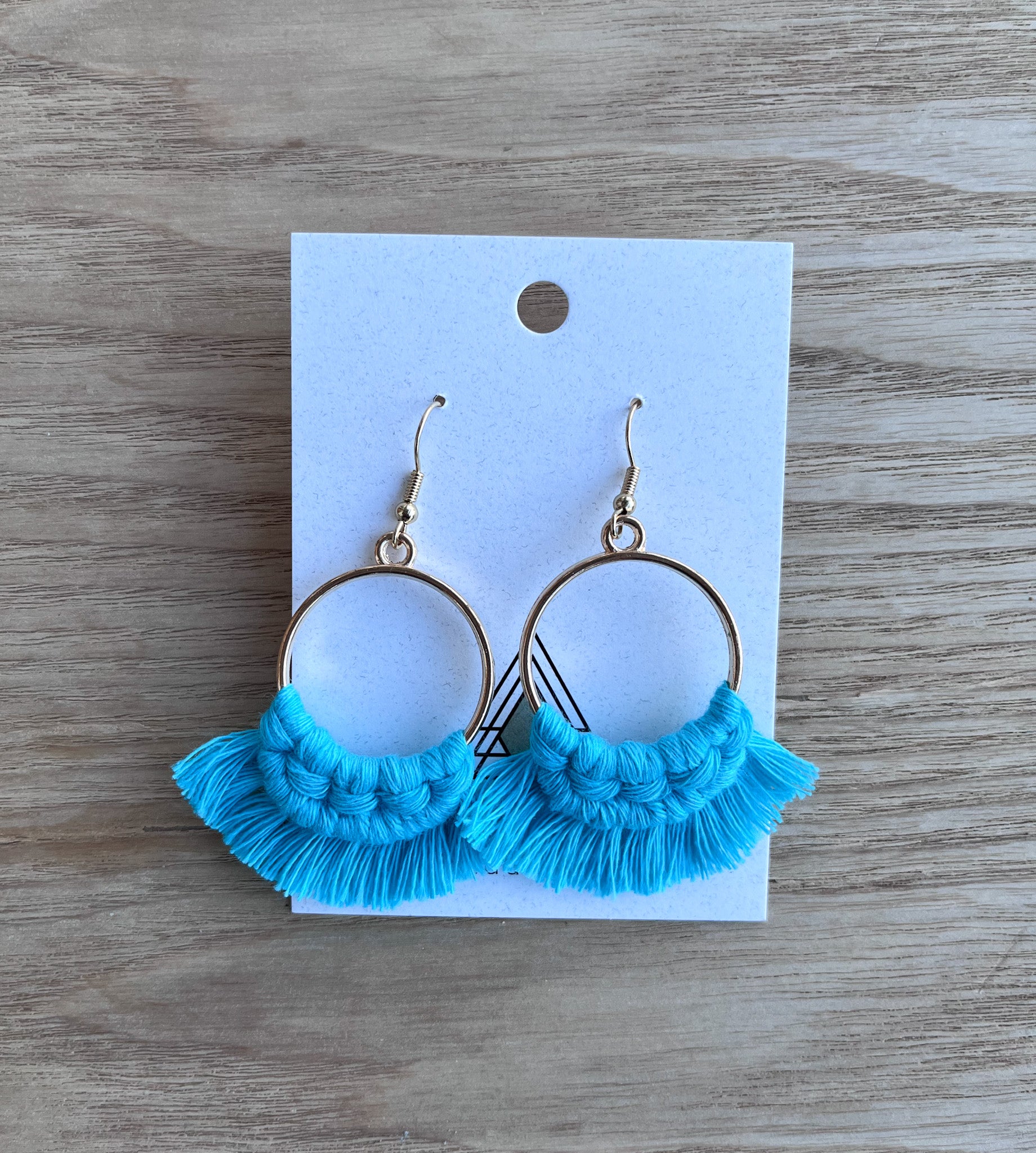 A pair of lightweight Spring Blue Rounds made from 100% cotton, showcasing a vibrant blue color, perfect for spring fashion.