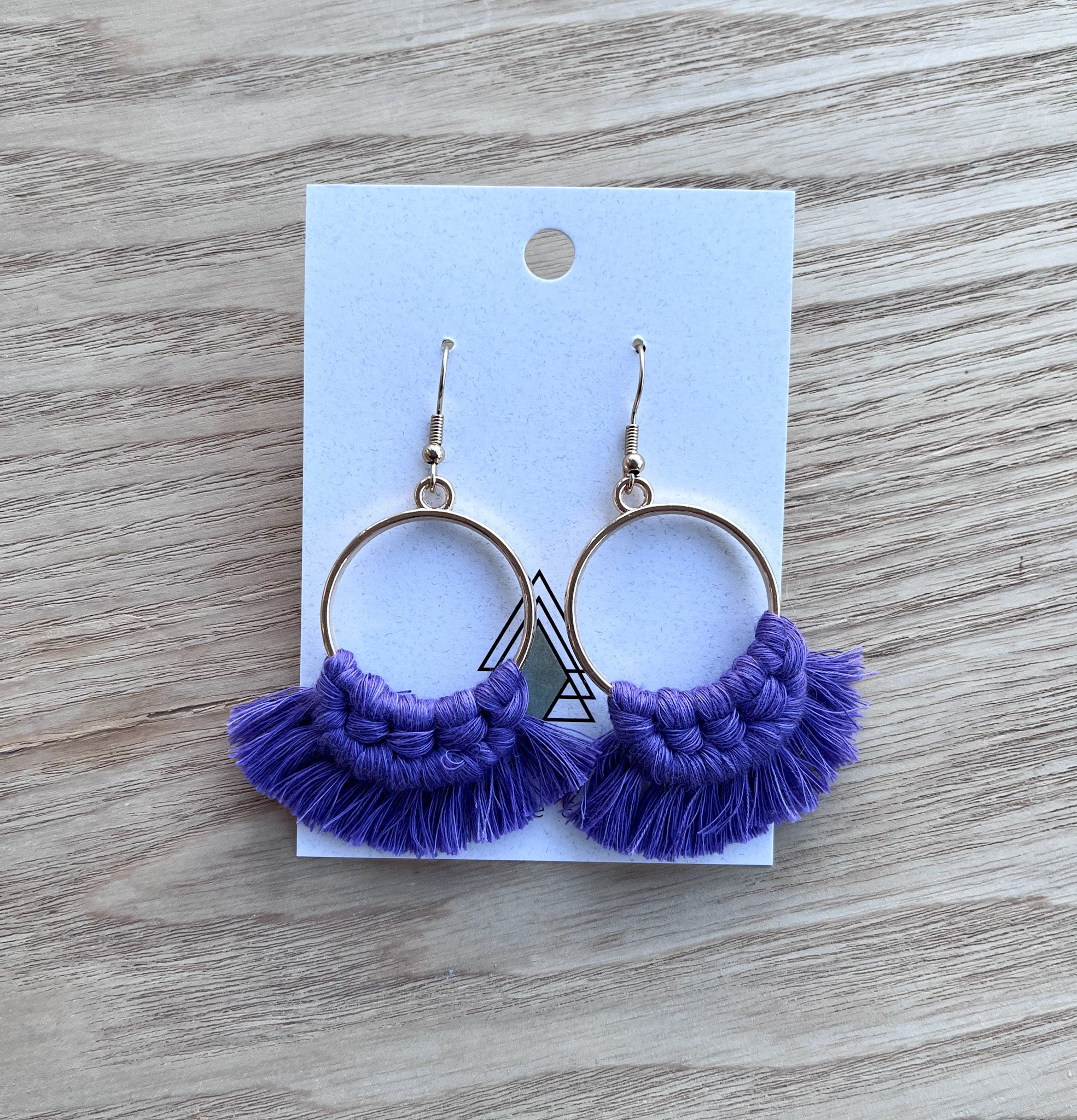 A pair of lightweight Spring Purple Rounds made from 100% cotton, showcasing a vibrant purple color, perfect for spring fashion.