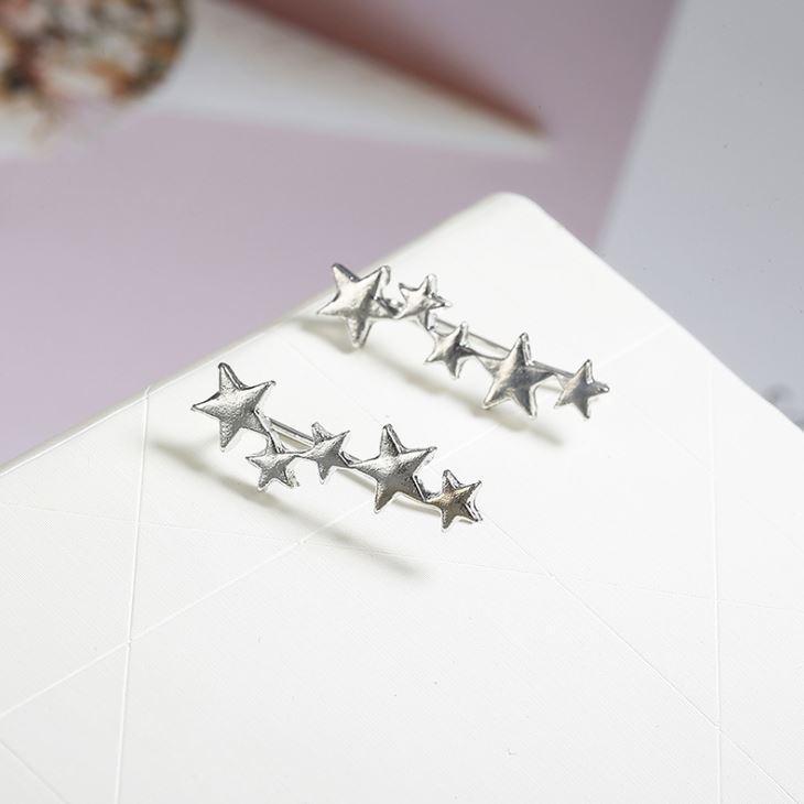 A pair of elegant Star Ear Crawlers made from high-quality zinc alloy, featuring a stylish star design.