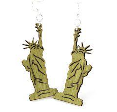 A pair of Statue of Liberty earrings made from sustainably sourced wood, featuring intricate laser-cut designs in vibrant Apple Green color.