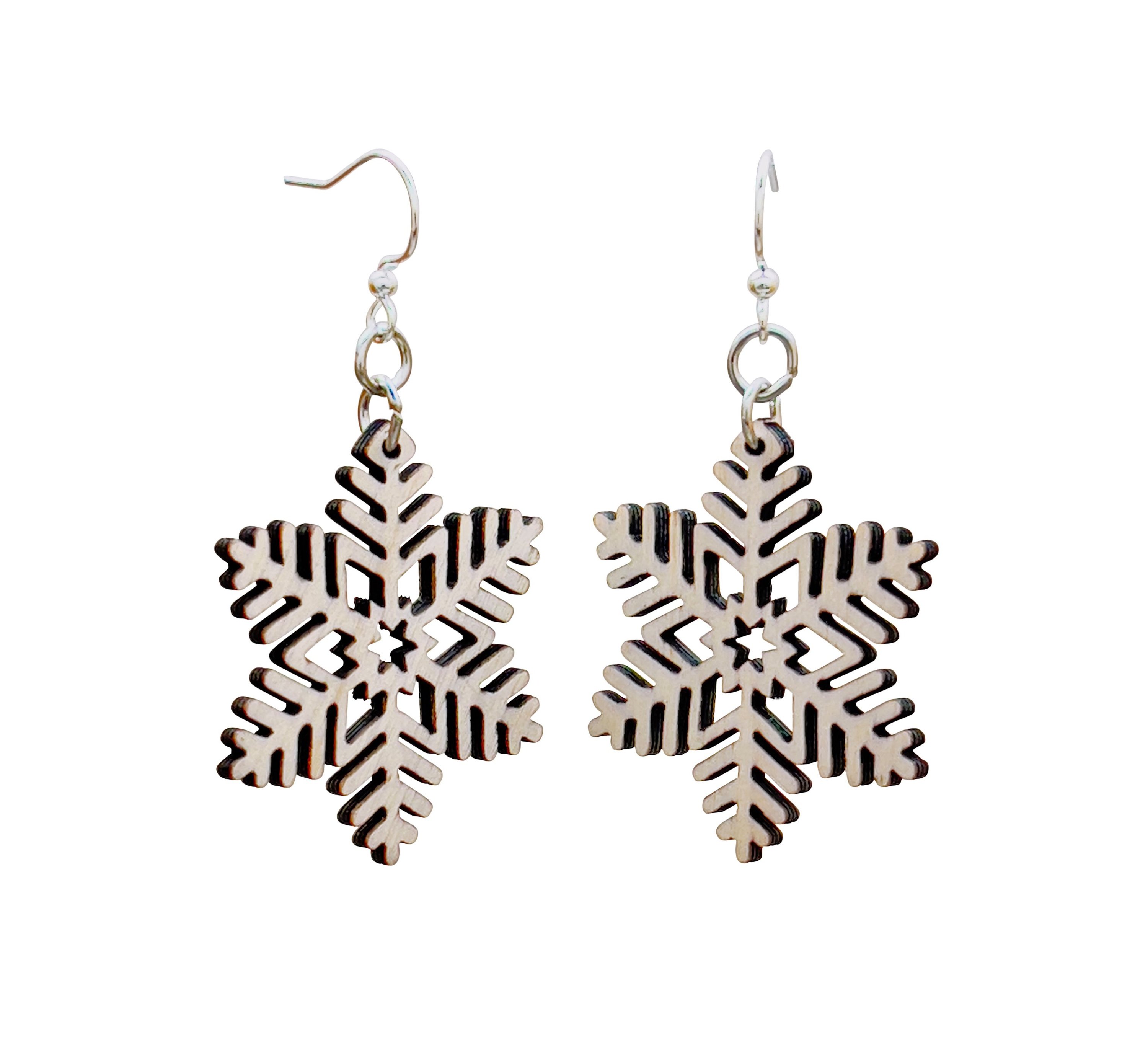 Stellar Snowflake Earrings made from sustainably sourced wood with intricate laser-cut design, featuring silver-finished hypoallergenic ear wires.