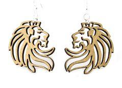 A pair of tan Stone Lion Earrings made from sustainably sourced wood, featuring intricate laser-cut designs and hypoallergenic silver-finished ear wires.