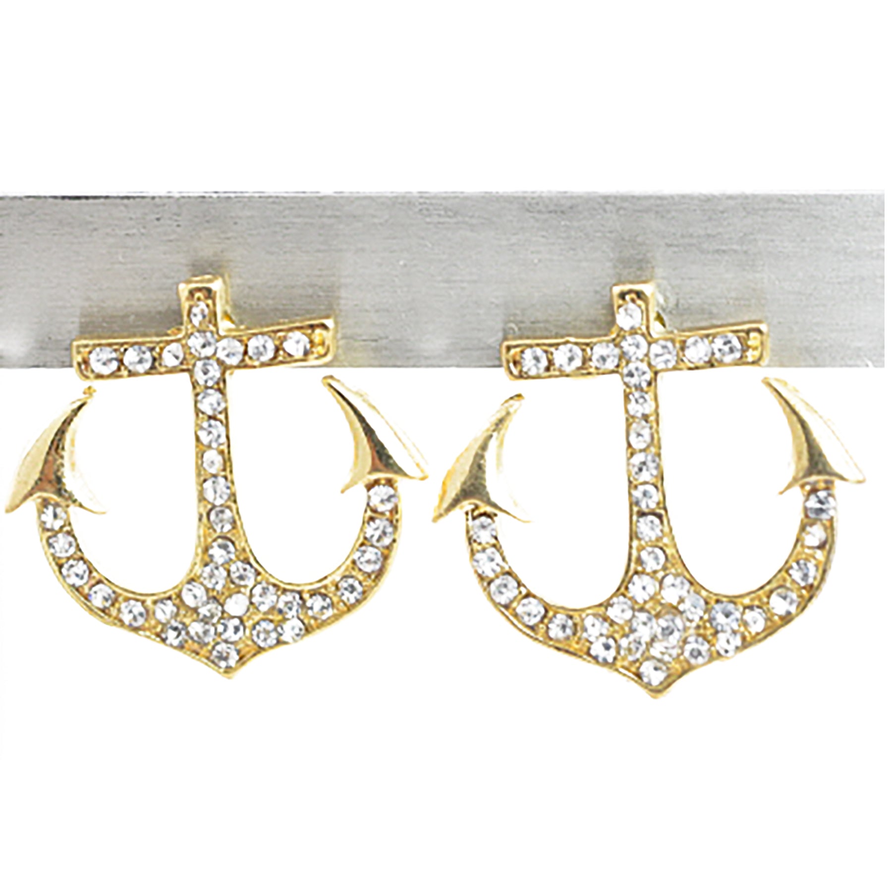 A pair of stylish studded anchor earrings with a post back, showcasing intricate detailing and a nautical theme.