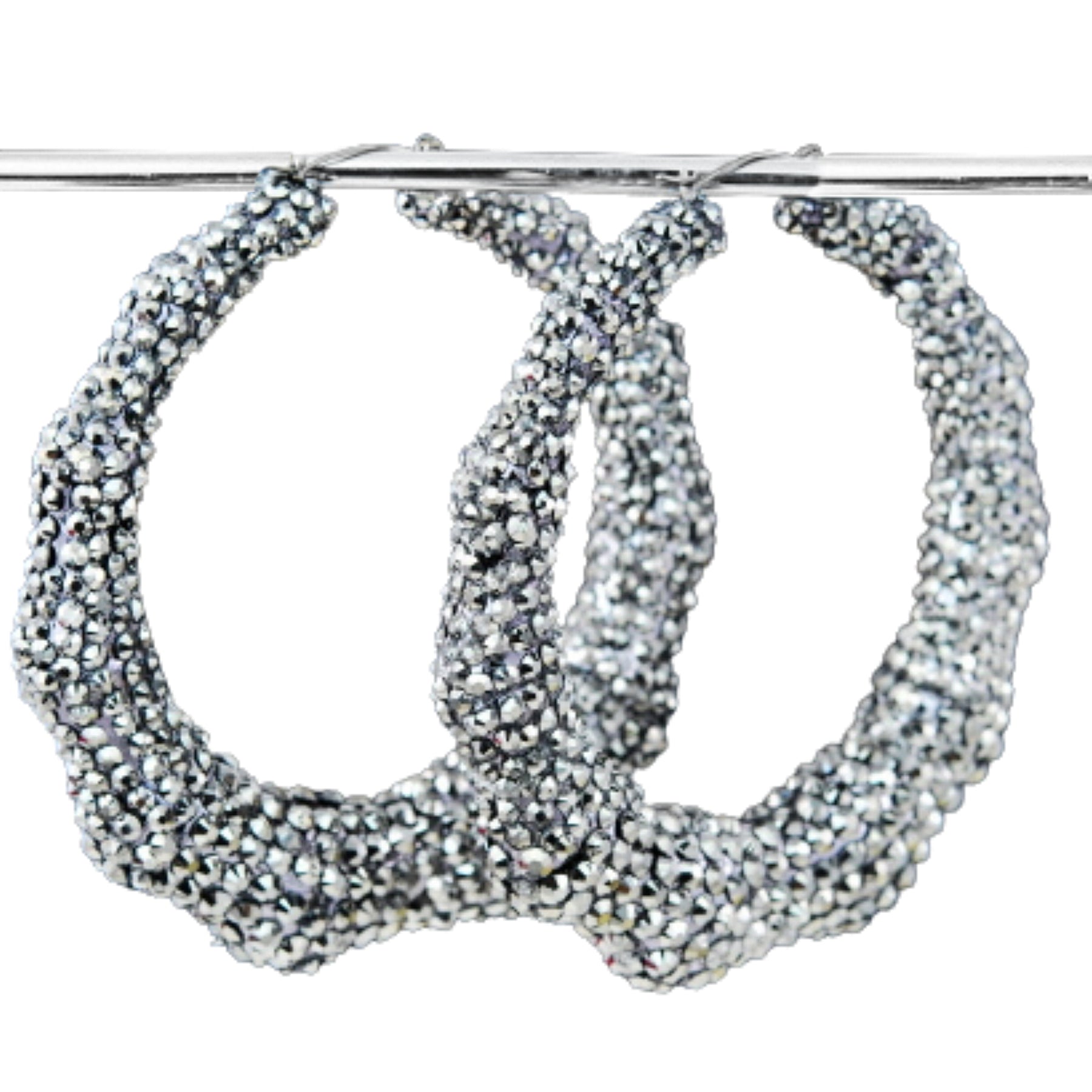 Large studded bamboo hoop earrings with lever back closure, showcasing a chic and stylish design.