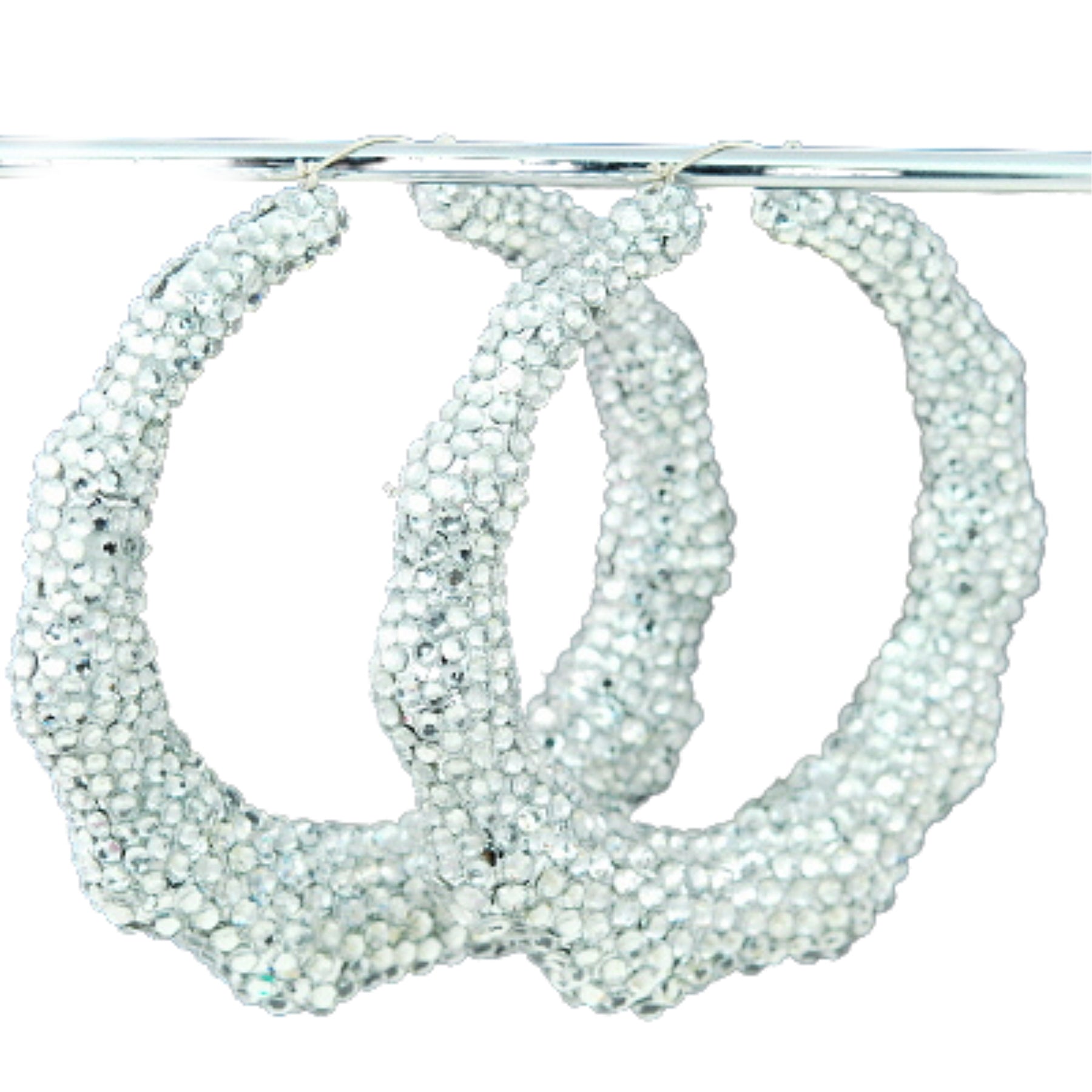 Large studded bamboo hoop earrings with lever back closure, showcasing a chic and stylish design.