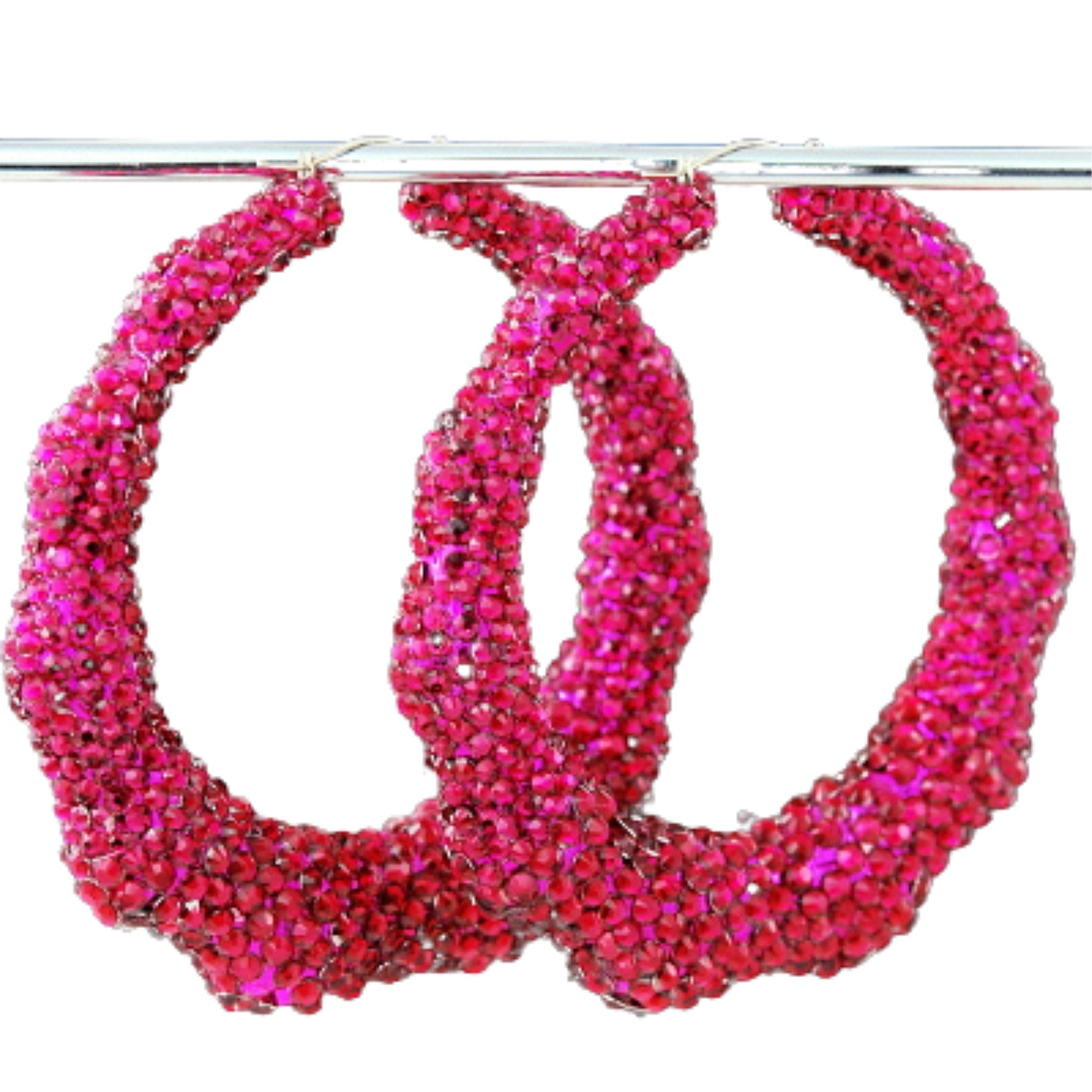 Large studded bamboo hoop earrings with lever back closure, showcasing a chic and stylish design.