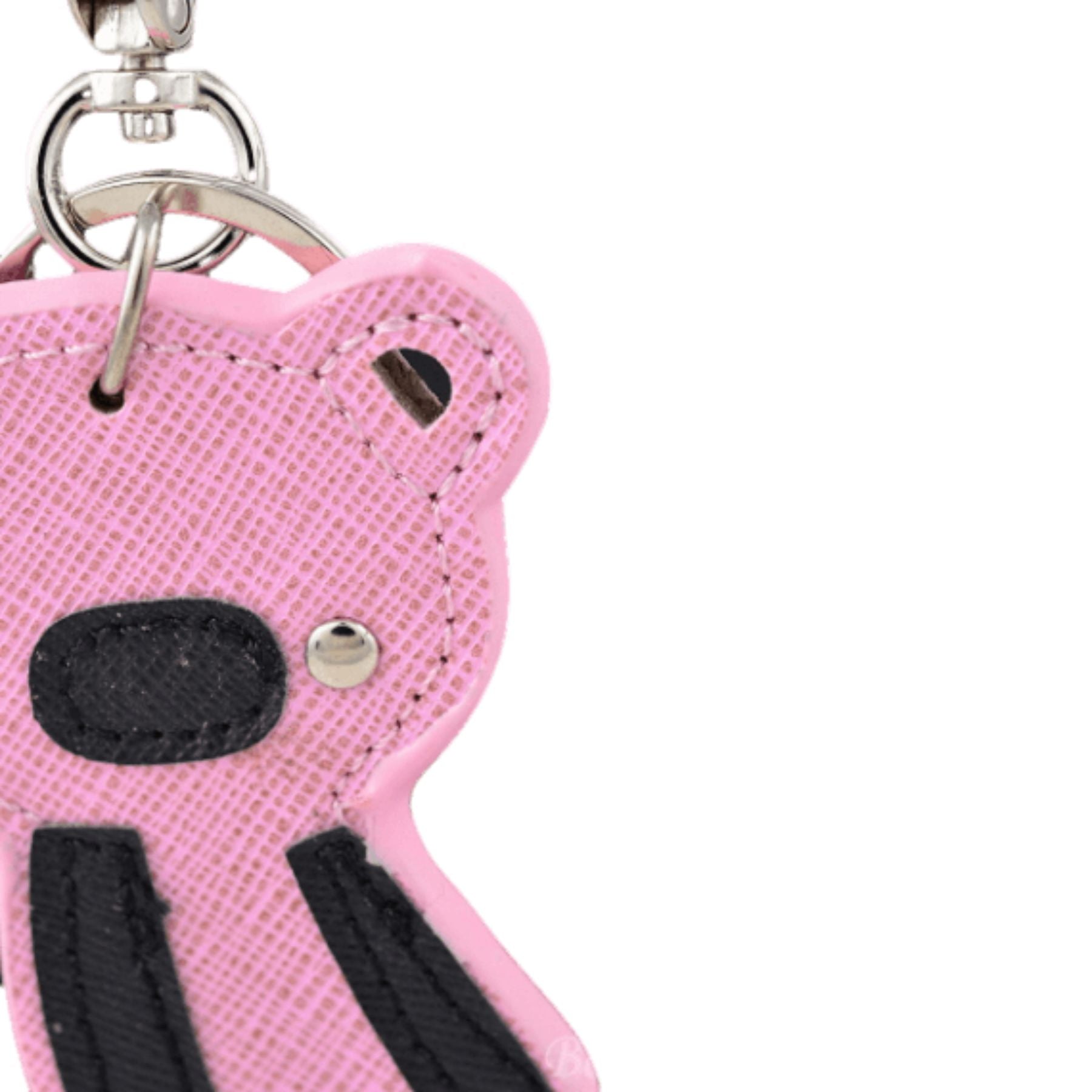 A stylish studded bear key chain with a lobster claw clasp, perfect for organizing keys.