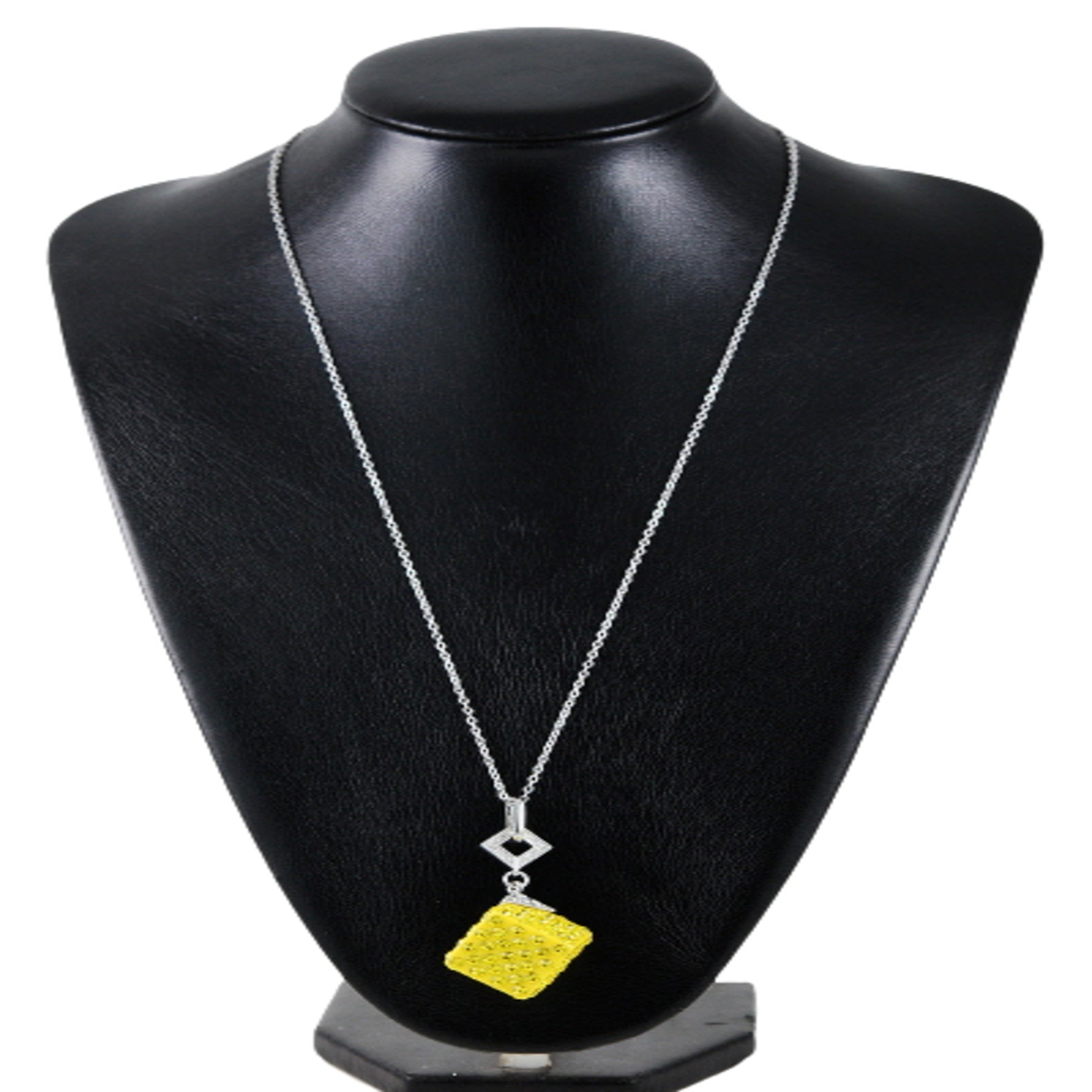 A stylish studded cube pendant necklace with a double plated finish and a 28-inch chain, featuring a lobster claw clasp.