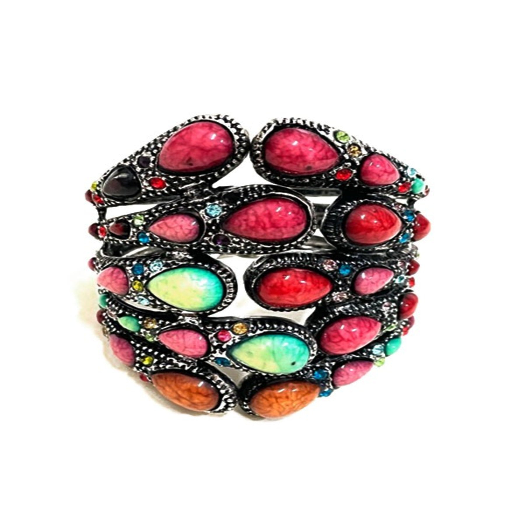 Stylish studded metal cuff bracelet with spring snap closure, showcasing a modern design perfect for any outfit.