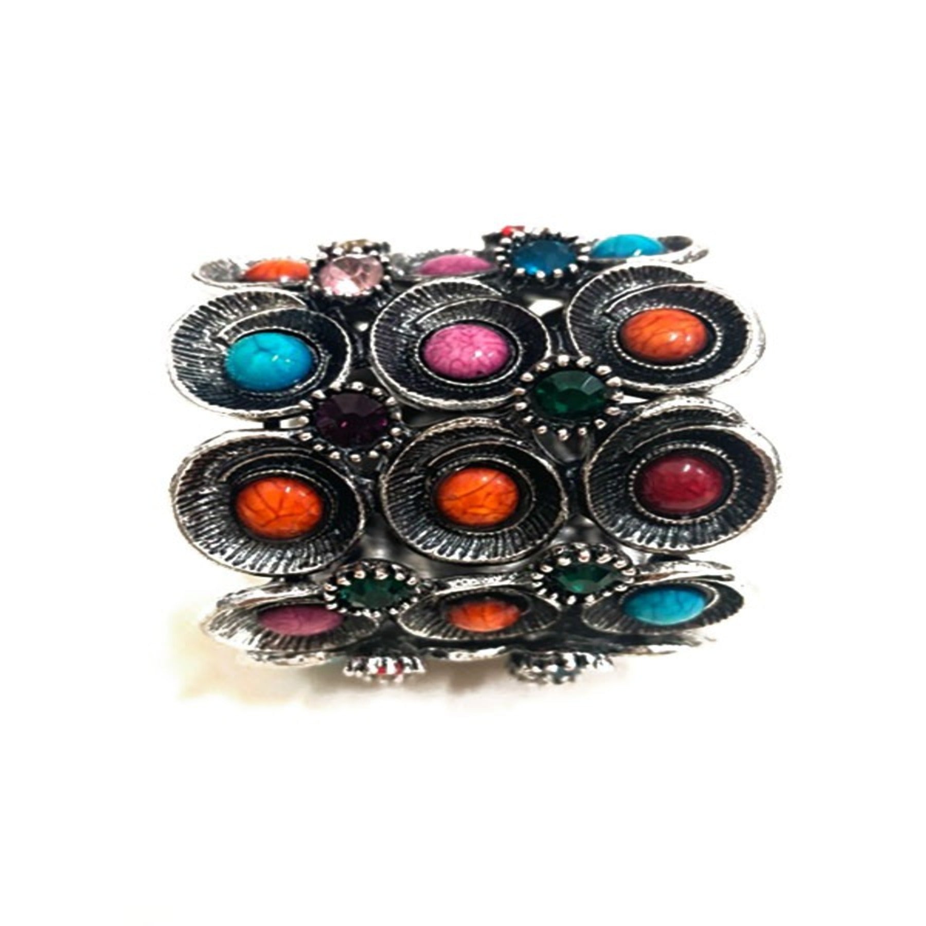 Stylish Studded Metal Cuff Bracelet with a chic design and spring wire closure, perfect for any occasion.