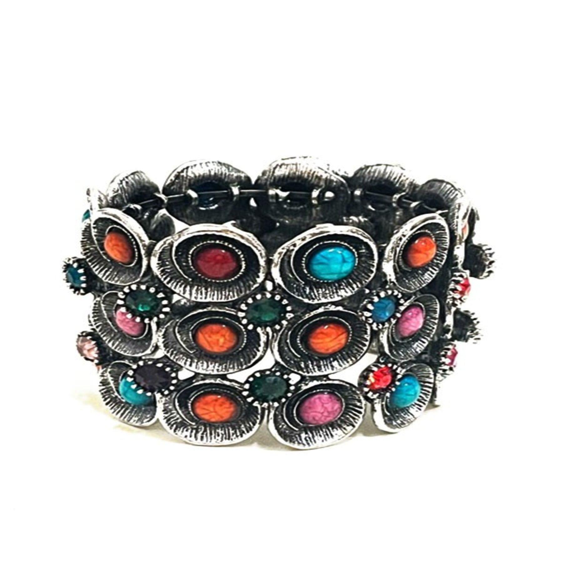 Stylish Studded Metal Cuff Bracelet with a chic design and spring wire closure, perfect for any occasion.