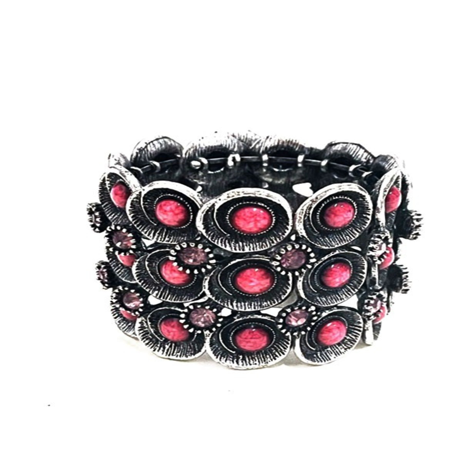 Stylish Studded Metal Cuff Bracelet with a chic design and spring wire closure, perfect for any occasion.