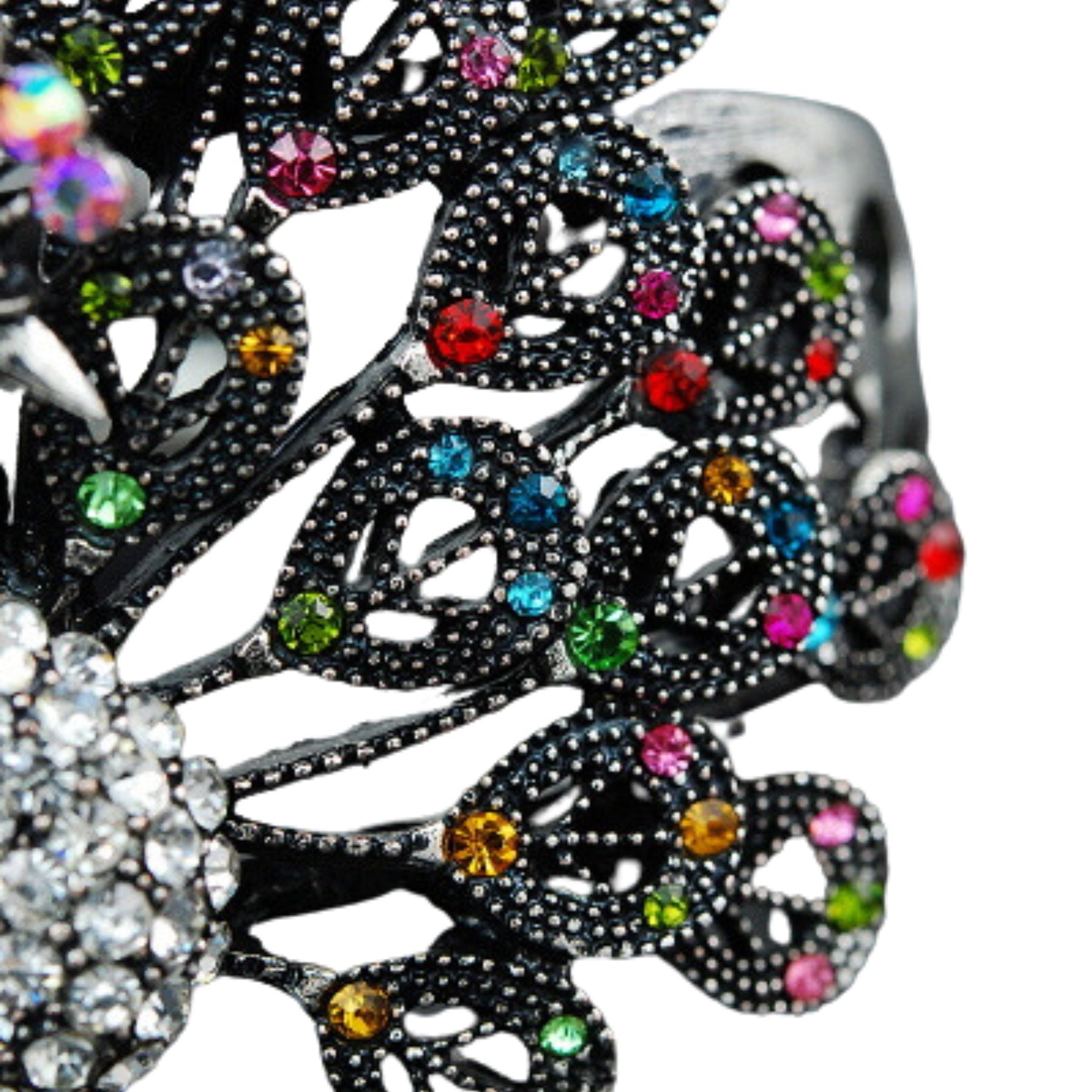 A stylish studded peacock metal cuff bracelet with intricate design and vibrant colors, featuring a secure spring snap closure.