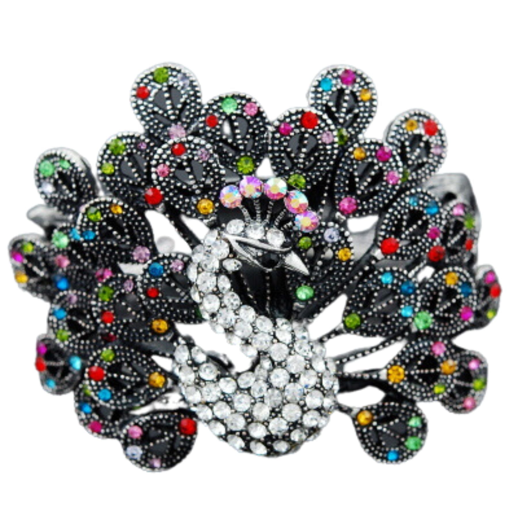 A stylish studded peacock metal cuff bracelet with intricate design and vibrant colors, featuring a secure spring snap closure.