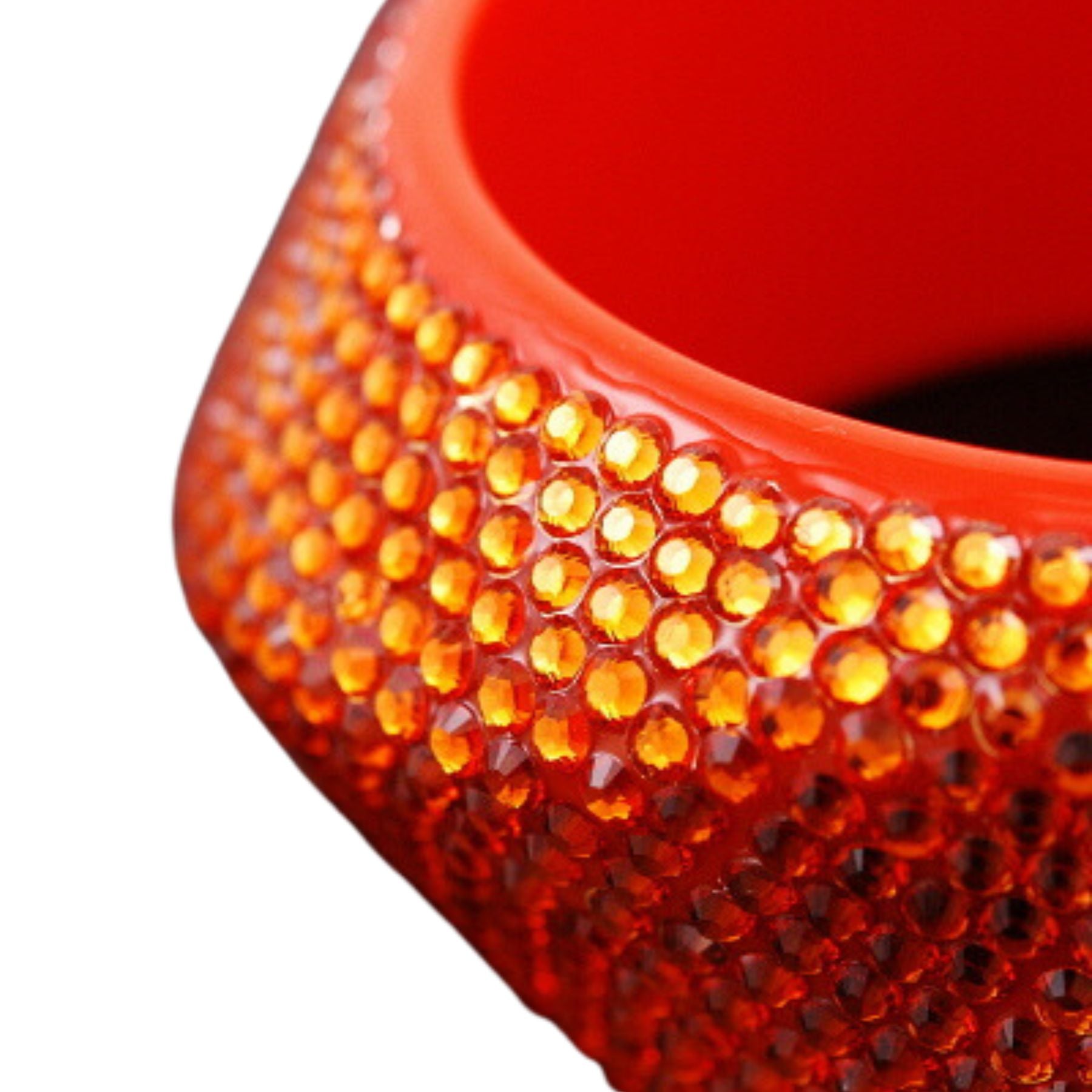 A stylish studded plastic bangle bracelet featuring a modern design with eye-catching studs, perfect for any outfit.