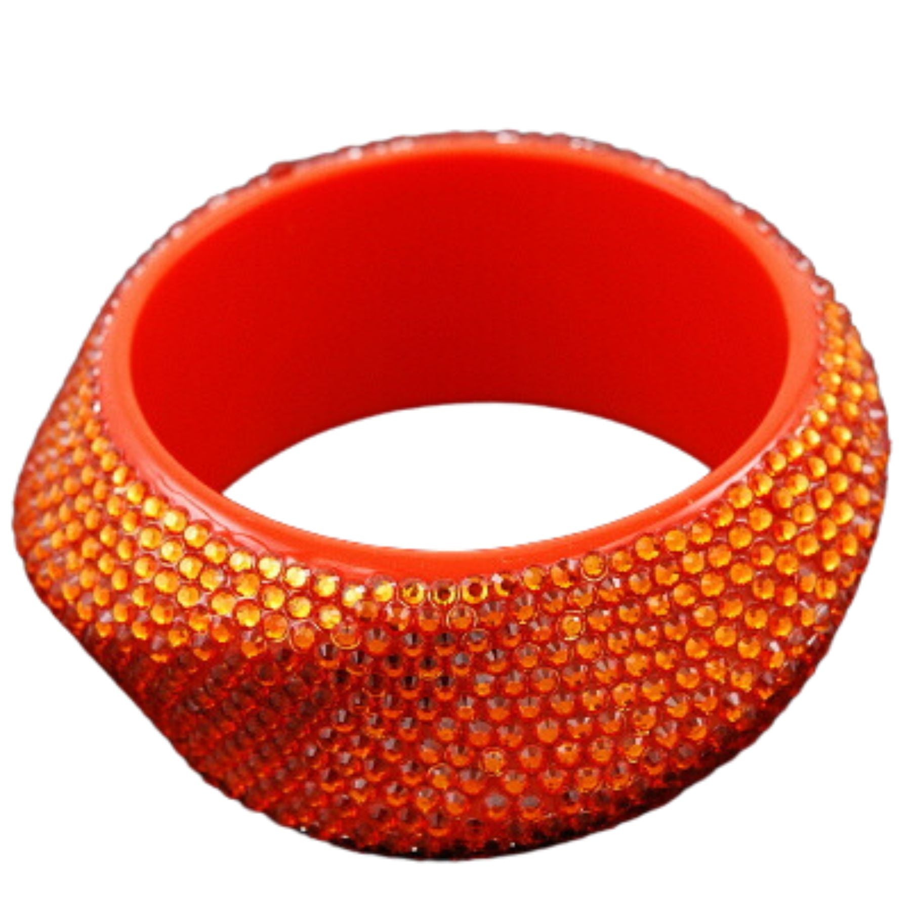 A stylish studded plastic bangle bracelet featuring a modern design with eye-catching studs, perfect for any outfit.