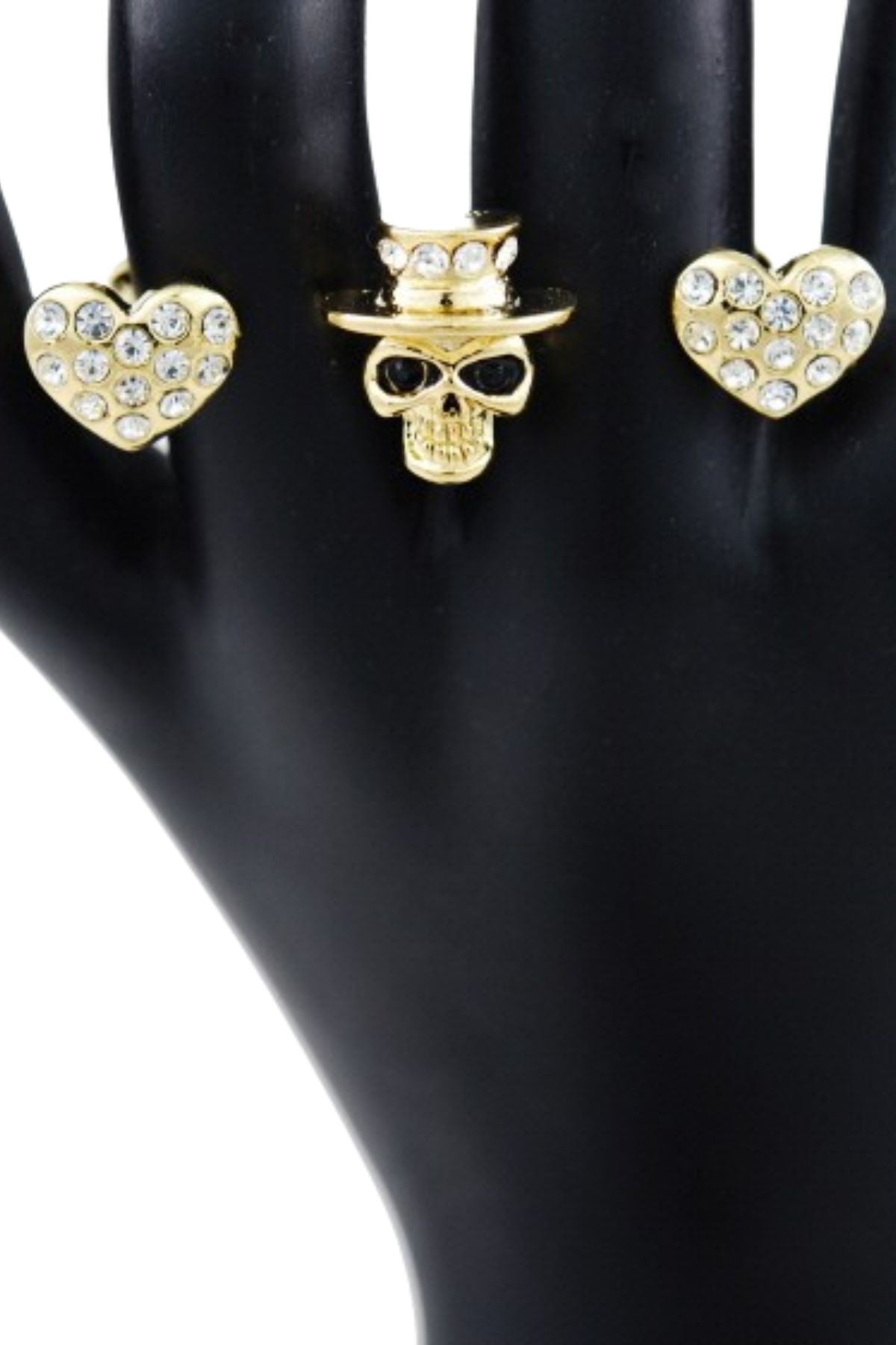 A detailed two-finger ring featuring a studded skull wearing a hat, showcasing its unique design and double plating.