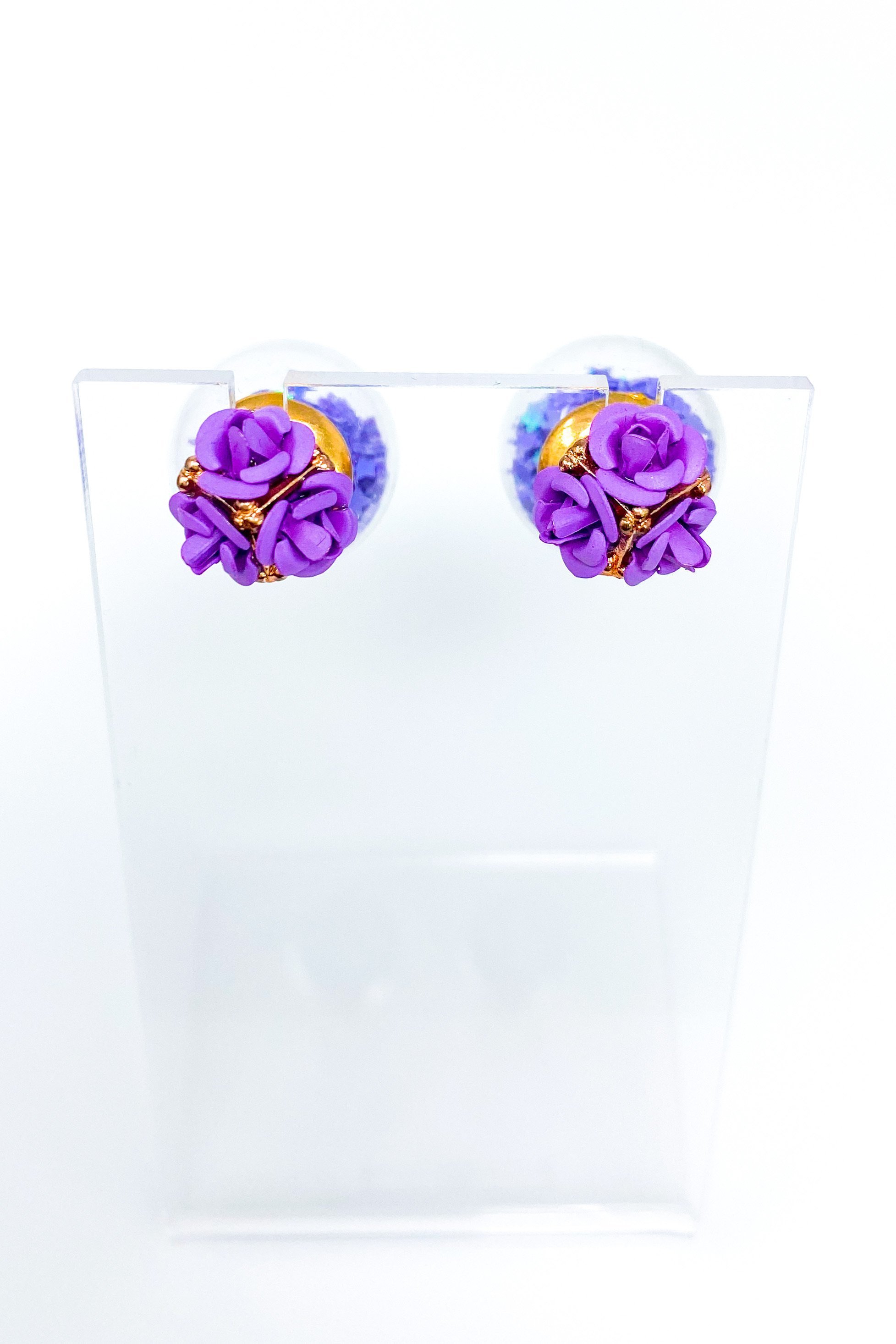 Star Blossom Studs featuring a flower trio design with iridescent stars in purple and pink colors, made from high-quality zinc alloy.