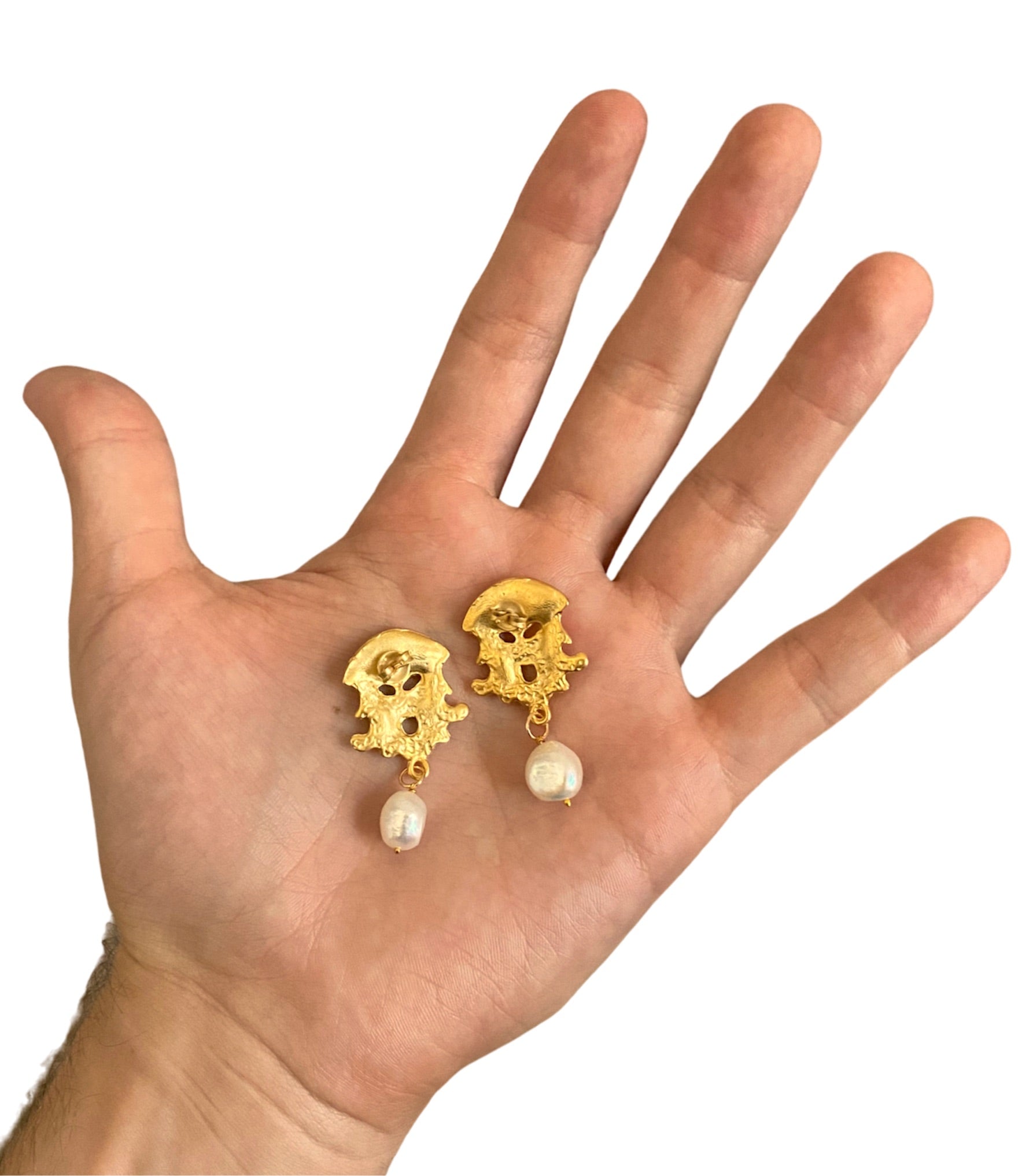 Elegant Taormina Theater Masks earrings featuring gold brass and natural pearls, inspired by ancient Greek-Roman theater.